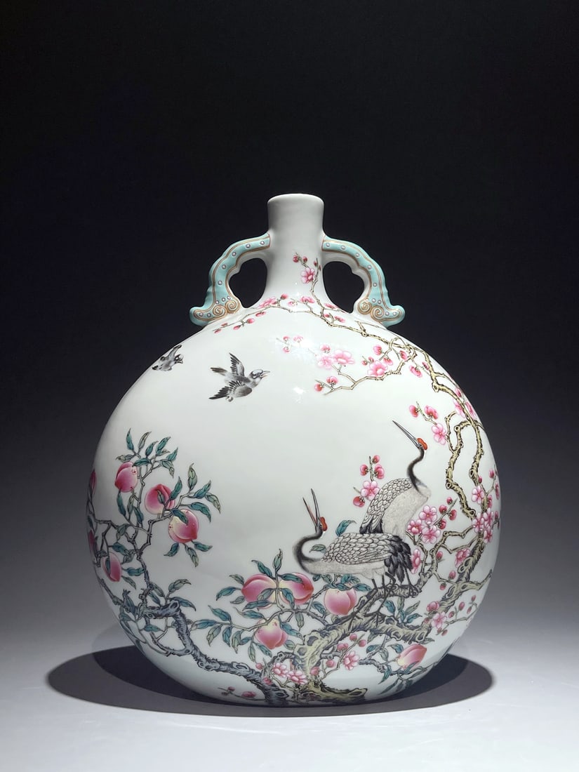 A FAMILLE ROSE 'BIRDS AND FLOWERS' PEACH AND CRANE MOONFLASK: A FAMILLE ROSE 'BIRDS AND FLOWERS' PEACH AND CRANE MOONFLASK Height:30.5cm,Diam:23.5cm