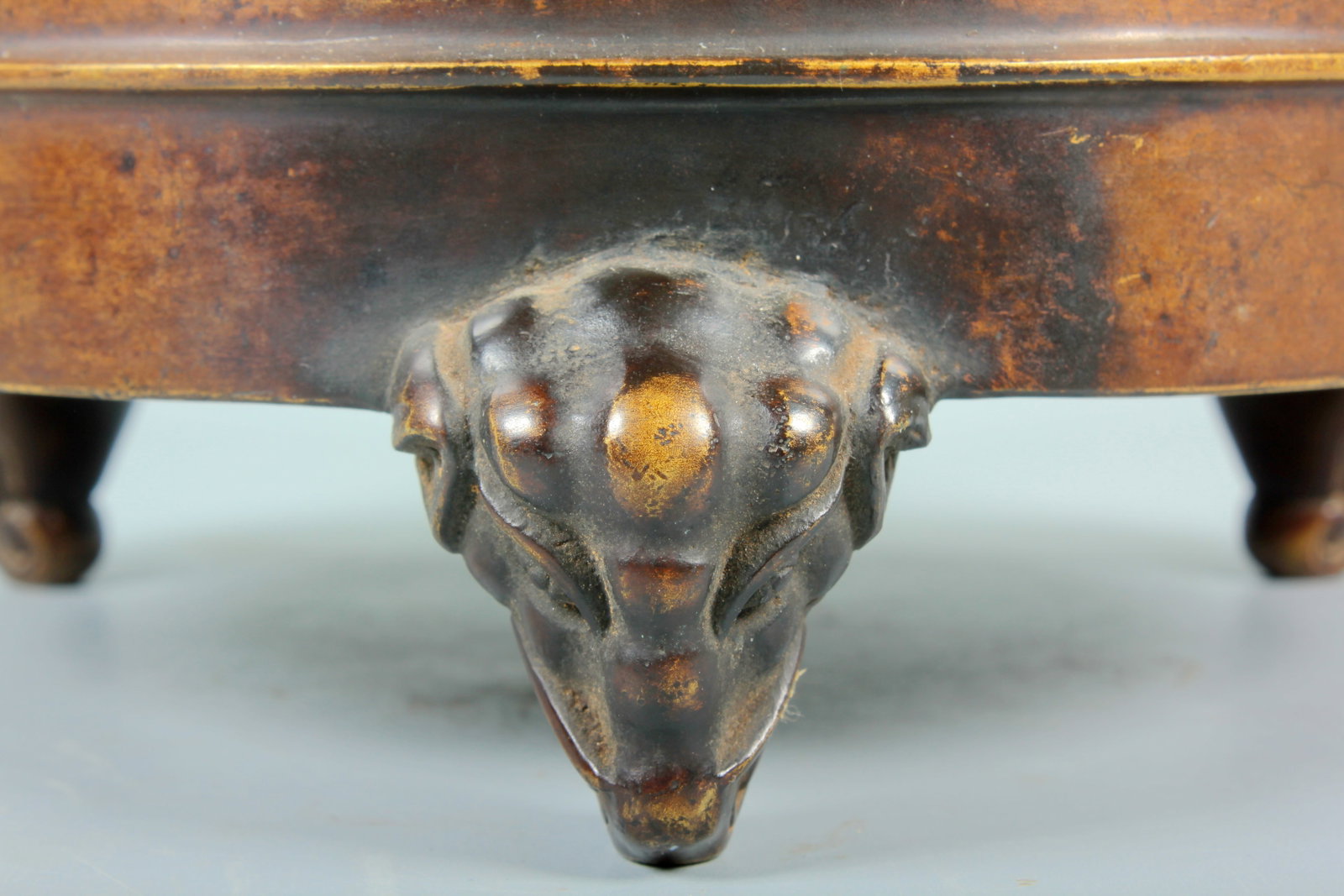 A ELEPHANT-LEGGED BOWSTRING PATTERN COPPER BURNER - 2