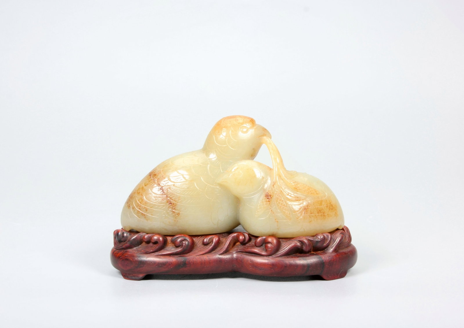A HETIAN JADE MANDARIN DUCK ORNAMENT: A HETIAN JADE MANDARIN DUCK ORNAMENT Size:Height:5cm,Length:4.4cm,Width:9.8cm