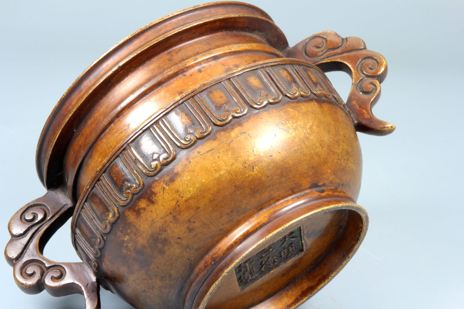 A BRONZE 'RUYI' HANDLED CENSER - 10