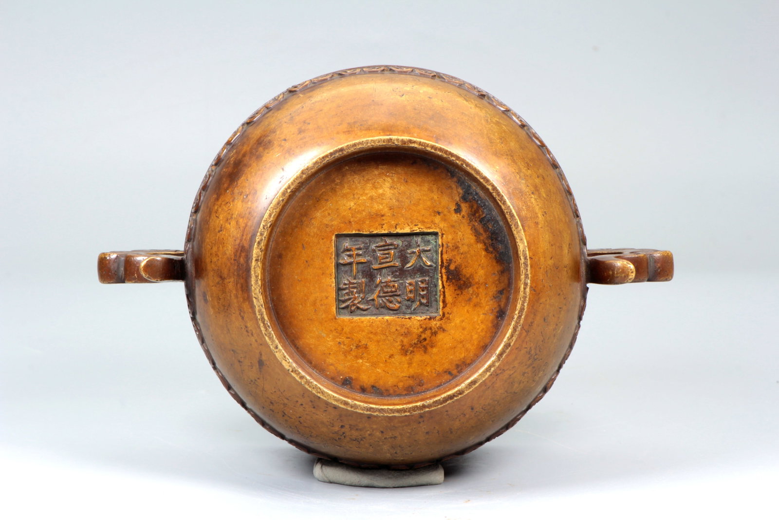 A BRONZE 'RUYI' HANDLED CENSER - 11