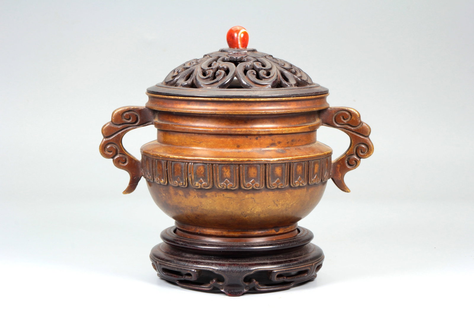 A BRONZE 'RUYI' HANDLED CENSER: A BRONZE 'RUYI' HANDLED CENSER Size?Height:15.3cm,Width:17cm;Weight:1308grams