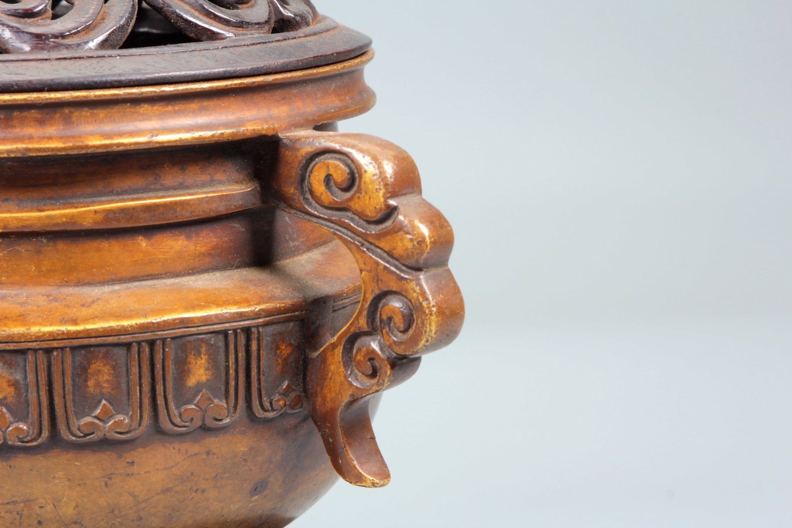 A BRONZE 'RUYI' HANDLED CENSER - 7