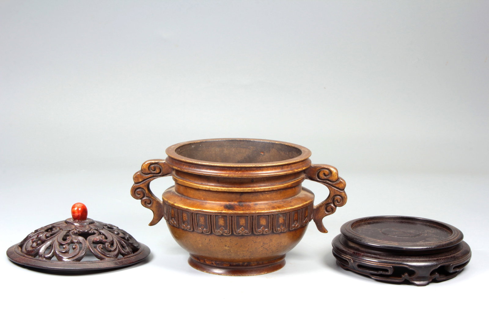 A BRONZE 'RUYI' HANDLED CENSER - 8