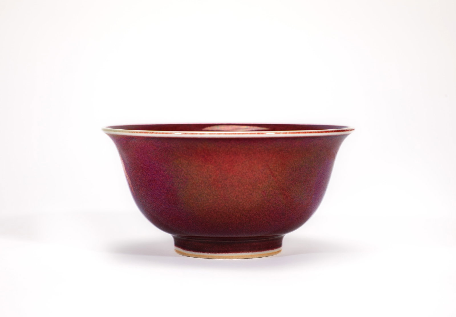 A RED-GLAZED 'THUMB' CUP: A RED-GLAZED 'THUMB' CUP Size:Width:10cm,Height:15cm