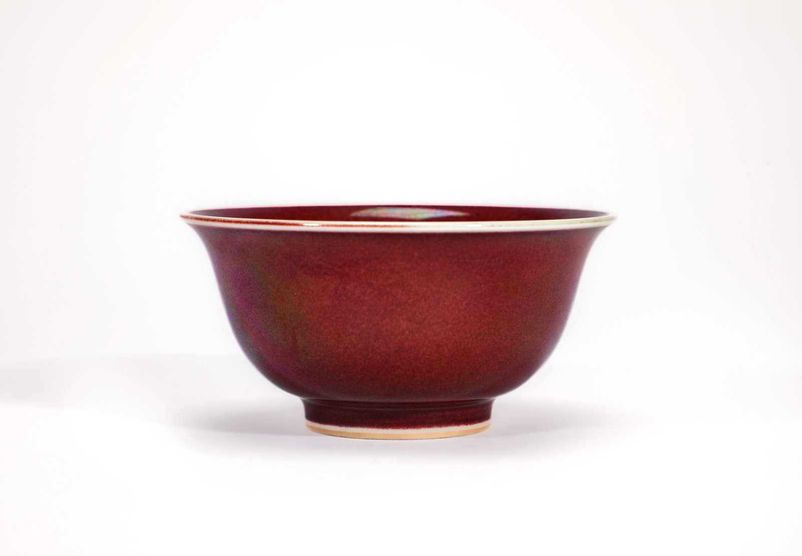 A RED-GLAZED 'THUMB' CUP - 2
