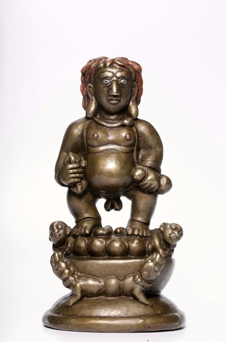 A BRONZE FIGURE OF BLACK JAMBHALA: A BRONZE FIGURE OF BLACK JAMBHALA Height:13.3cm,Length:7cm,Width:6.8cm;Weight:572grams
