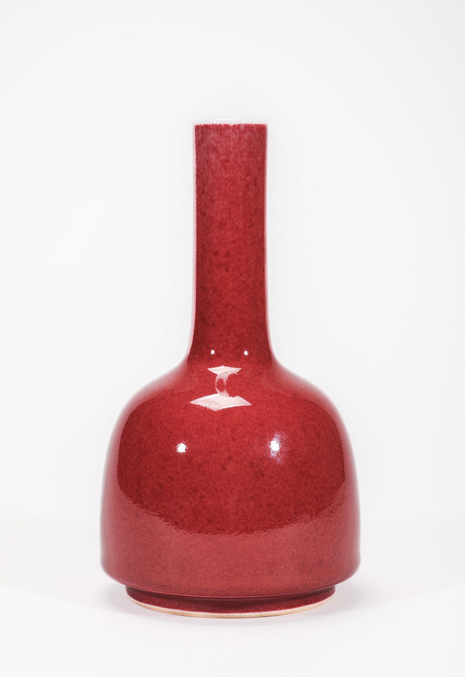 A SACRIFICIAL-RED-GLAZED BELL-FORM VASE: A SACRIFICIAL-RED-GLAZED BELL-FORM VASE Size:Width:9cm,Height:19cm