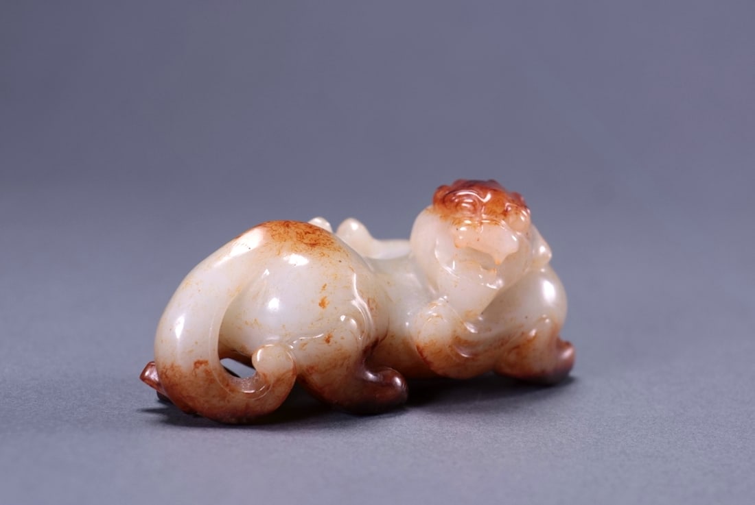 A JADE MYTHICAL BEAST: A JADE MYTHICAL BEAST Length:9.8cm,Width:4.5cm,Height:4.8cm