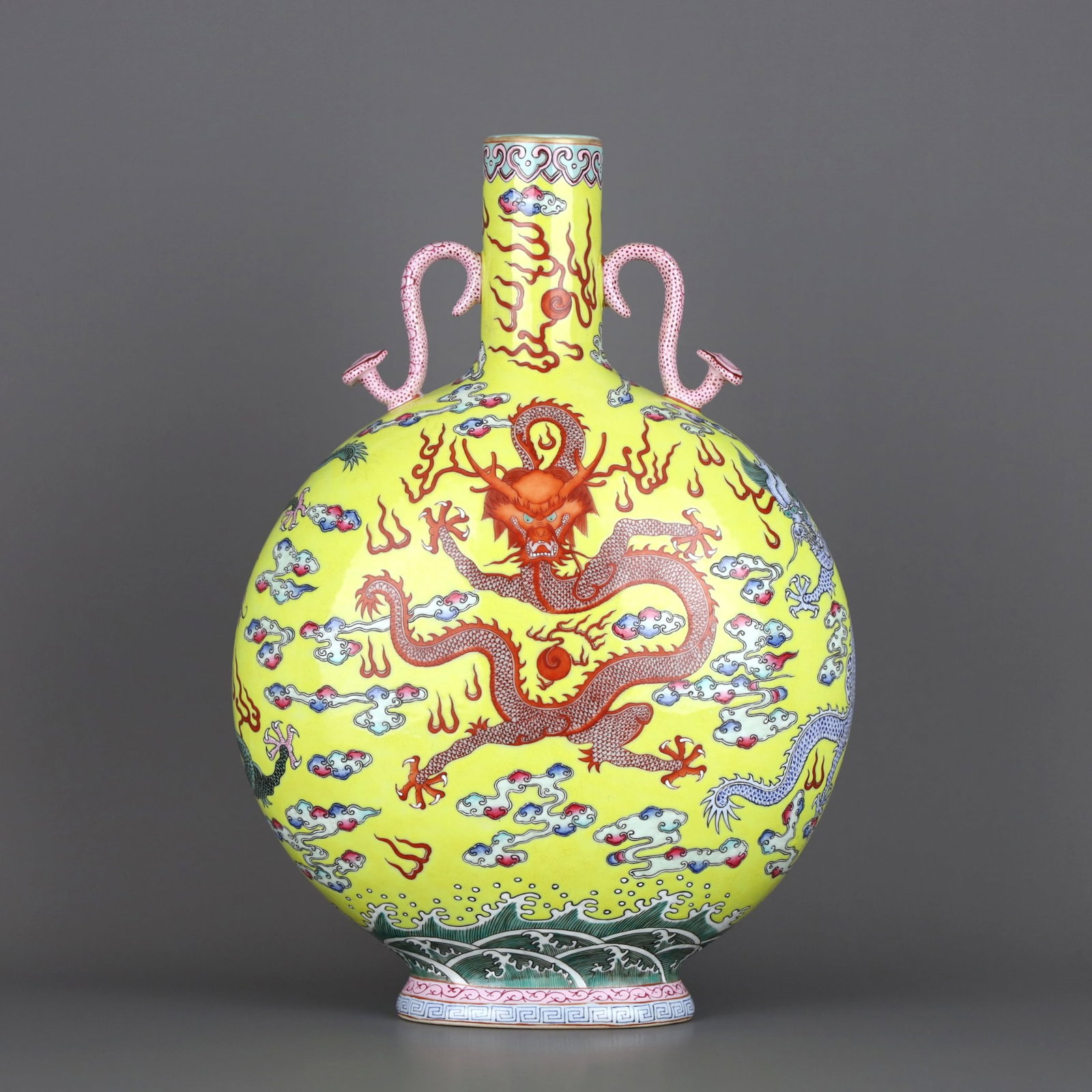 A YELLOW-GROUND FAMILLE ROSE 'DRAGON AND WAVES' MOONFLASK: A YELLOW-GROUND FAMILLE ROSE 'DRAGON AND WAVES' MOONFLASK Height:35cm,Diam:24.6cm