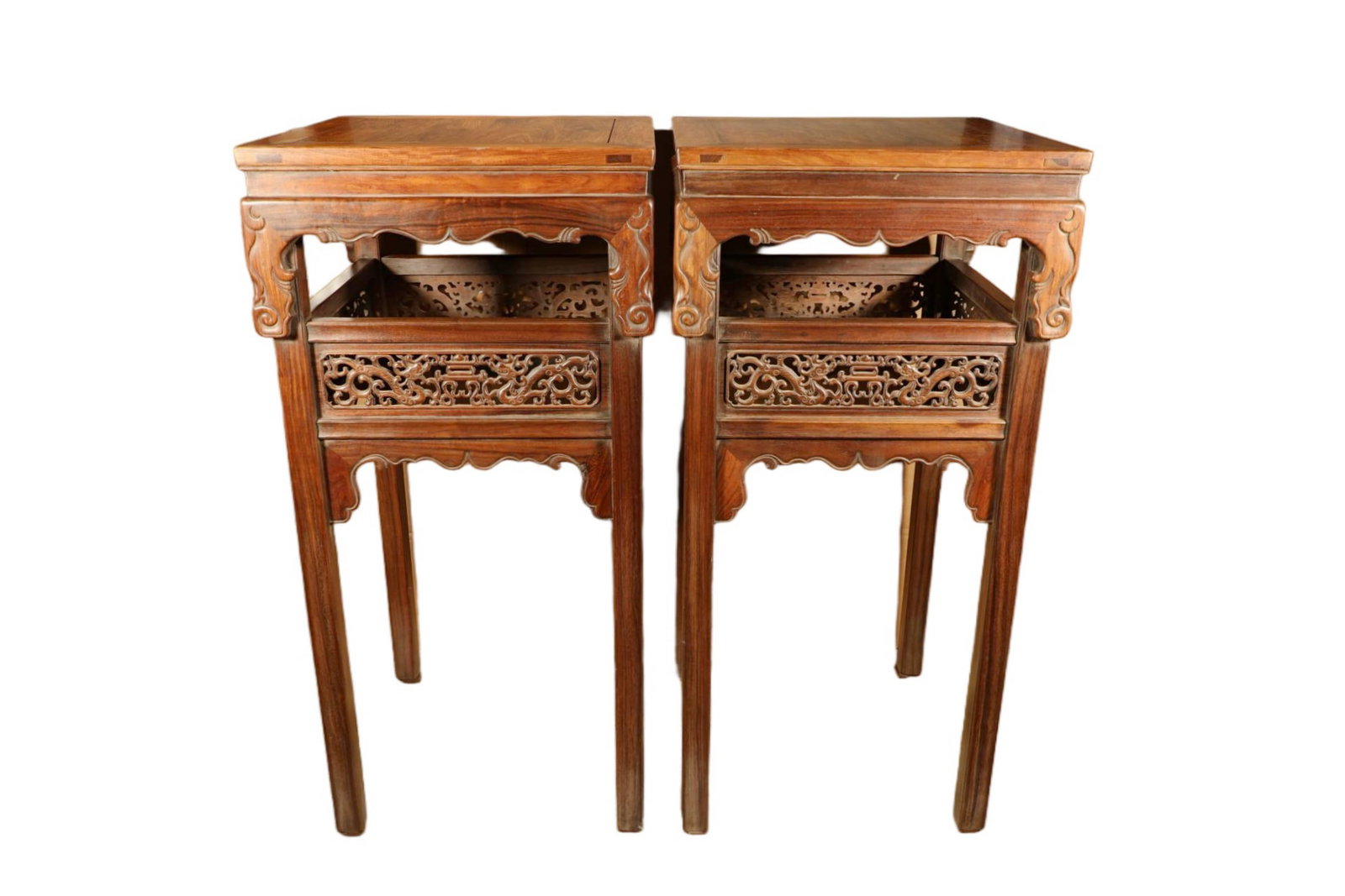 A PAIR OF HUANGHUALI DRAGON-CARVED INCENSE STANDS: A PAIR OF HUANGHUALI DRAGON-CARVED INCENSE STANDS Size:Height:100cm,Width:49cm