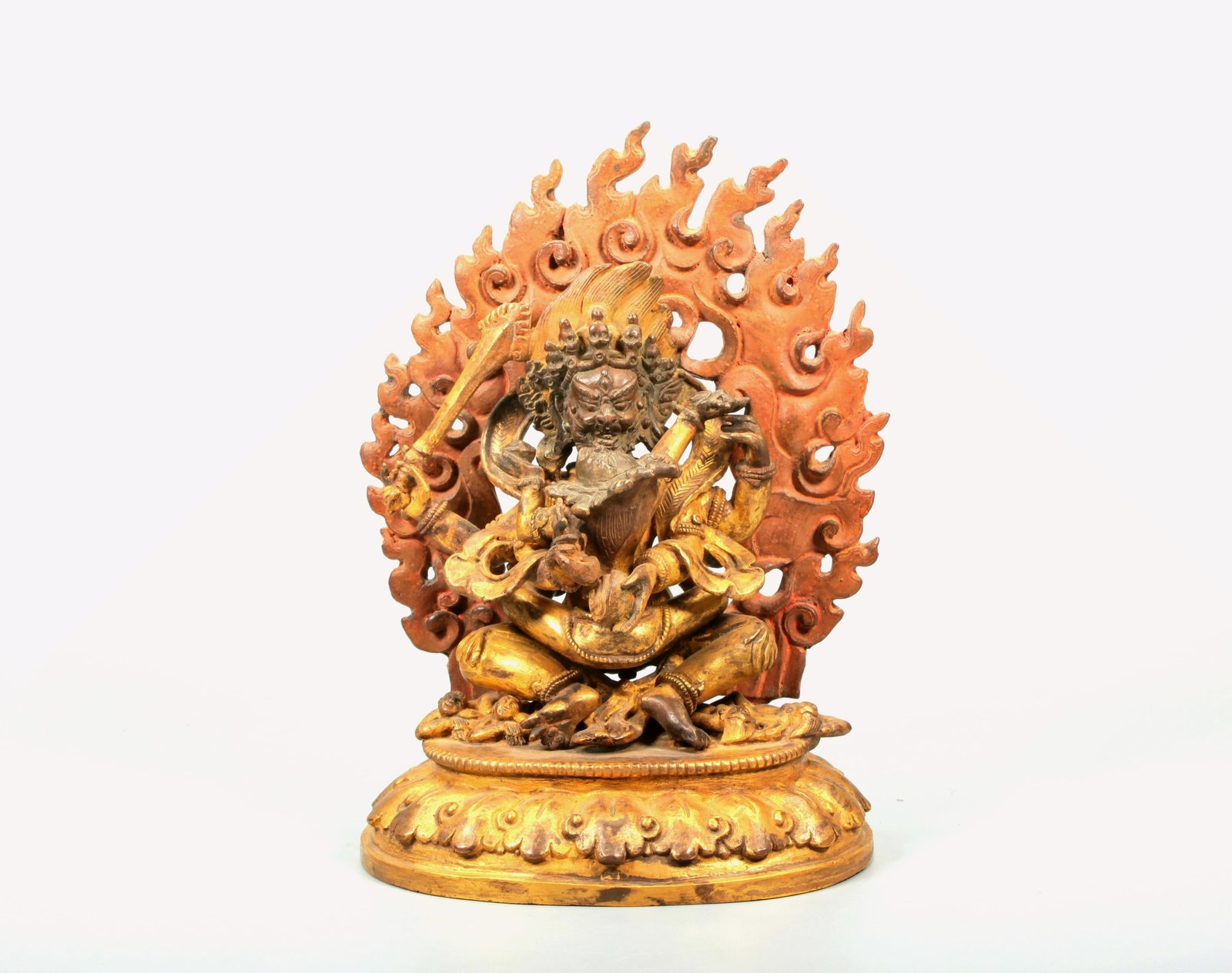 A GILT-BRONZE FIGURE OF SAMBHARA BUDDHA: A GILT-BRONZE FIGURE OF SAMBHARA BUDDHA Size:Height:18.4cm,Width:12.9cm