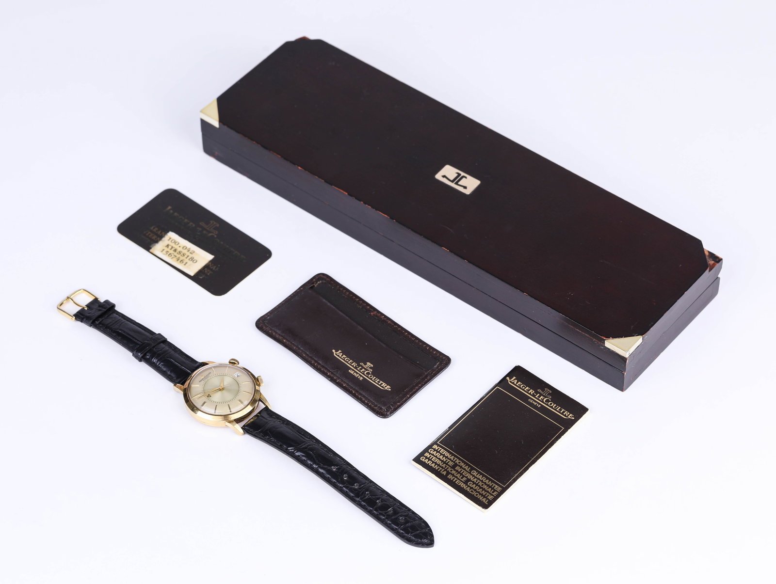 A JAEGER-LECOULTRE 18K GOLD WRISTWATCH: A JAEGER-LECOULTRE 18K GOLD WRISTWATCH Description: Powered by a 1950s bumper-type automatic movement, additionally equipped with an alarm function.Dimensions: Weight: 55 g. Width: 3.8 cm. All
