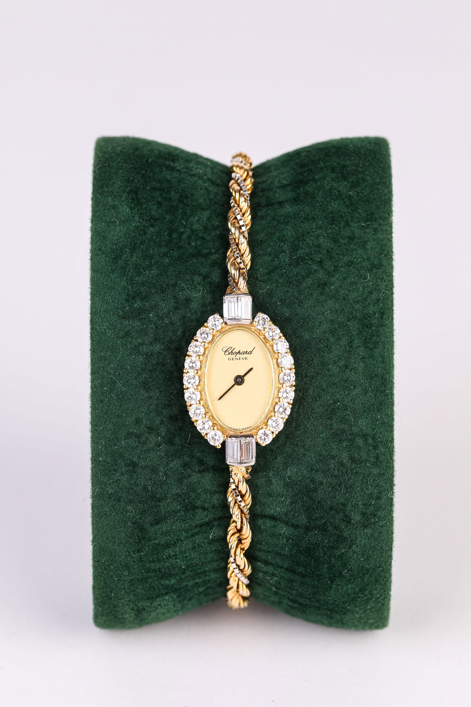 A CHOPARD DIAMOND AND GOLD POCKET WATCH: A CHOPARD DIAMOND AND GOLD POCKET WATCH Description: Dimensions: Width: 16 mm x Height: 25 mm. All measurements are approximate.