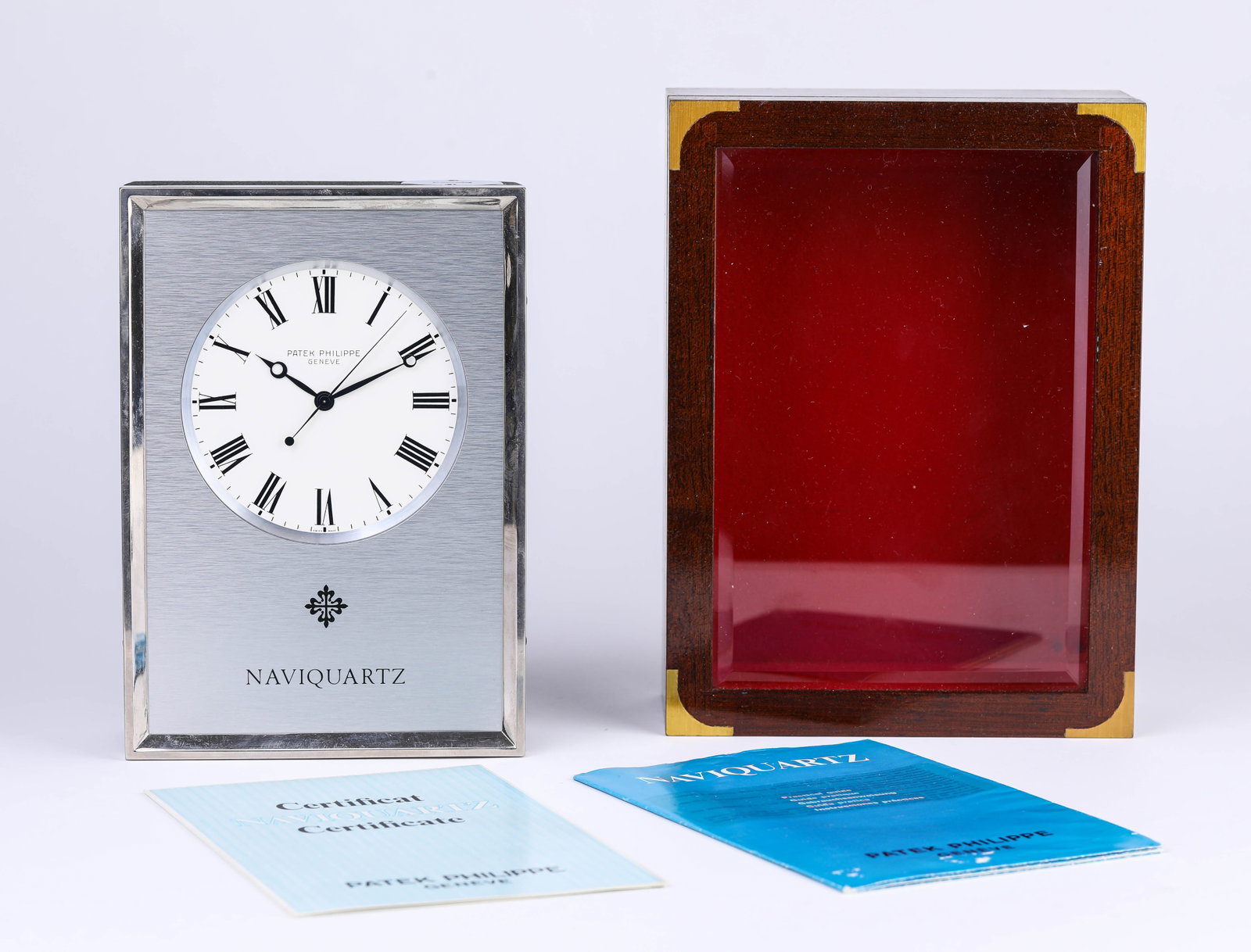 A PATEK PHILIPPE MARINE CHRONOMETER: A PATEK PHILIPPE MARINE CHRONOMETER Description: Dimensions: Weight: 1535 g. Length: 14.1 cm x Width: 5.8 cm x Height: 20.1 cm. All measurements are approximate.