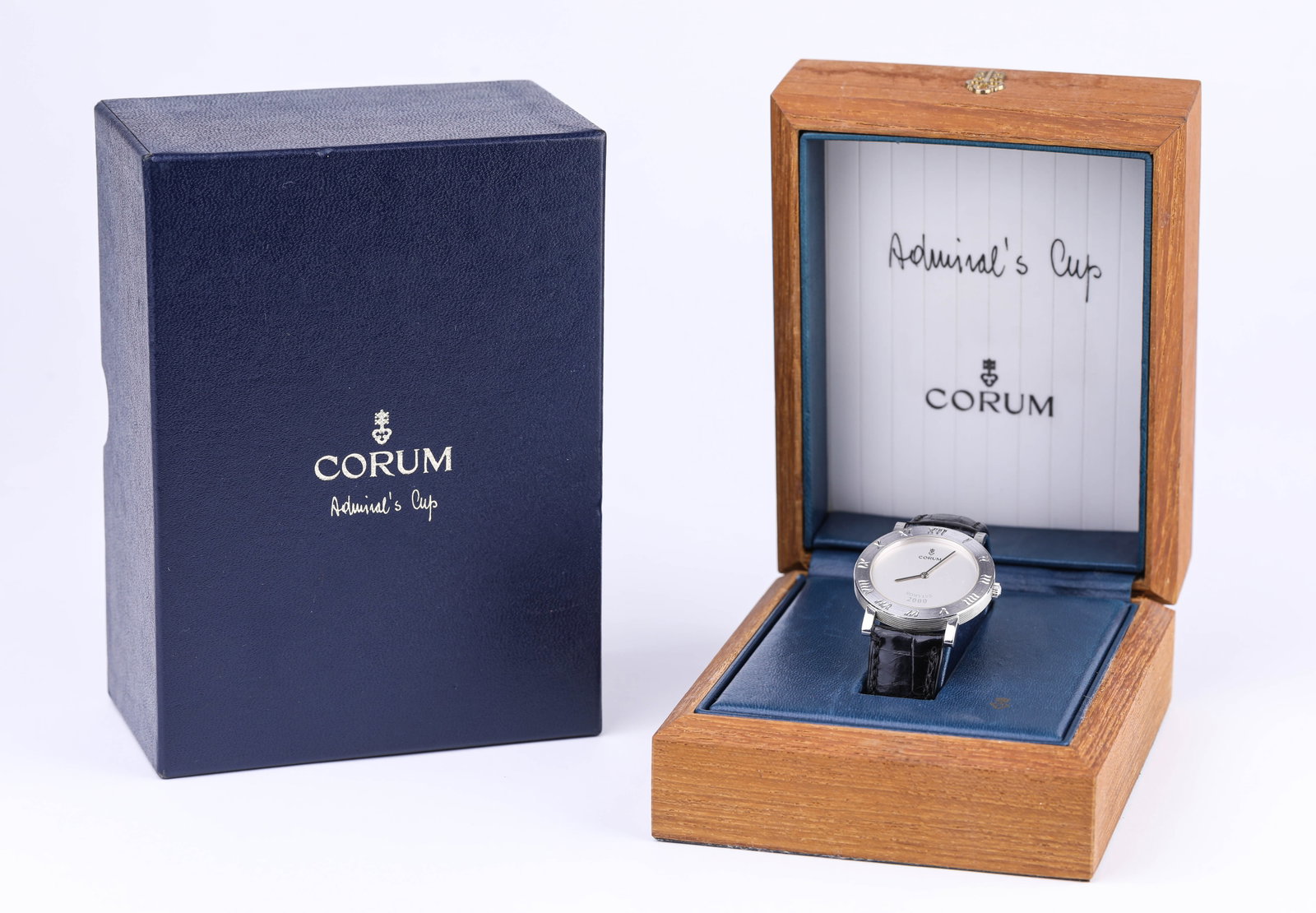 A CORUM 2000 ANNIVERSARY WRISTWATCH: A CORUM 2000 ANNIVERSARY WRISTWATCH Description: Worldwide limited edition of 100 pieces, featuring an off-centred automatic winding movement.Dimensions: Weight: 55 g. Width: 36.6 mm. All