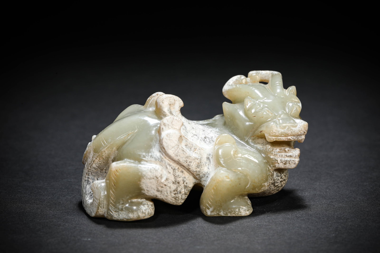 A JADE KYLIN: A JADE KYLIN Description: Dimensions: Length: 9.4 cm x Width: 5.7 cm x Height: 4.8 cm. All measurements are approximate.
