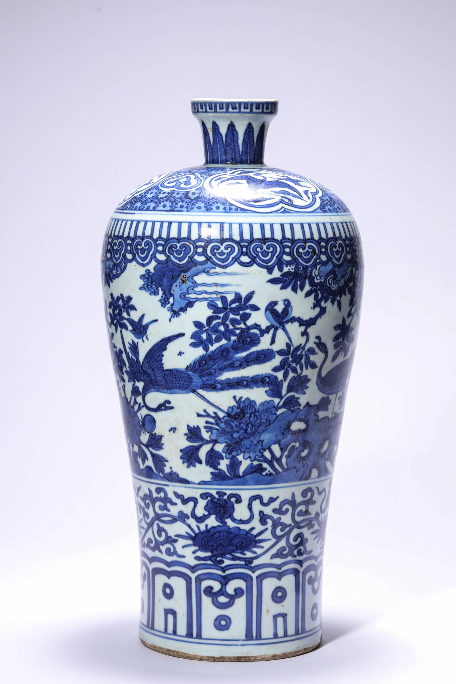 A BLUE AND WHITE 'FLOWERS AND BIRDS' MEIPING: A BLUE AND WHITE 'FLOWERS AND BIRDS' MEIPING Description: Dimensions: Width: 18.7 cm x Height: 40.3 cm. All measurements are approximate.
