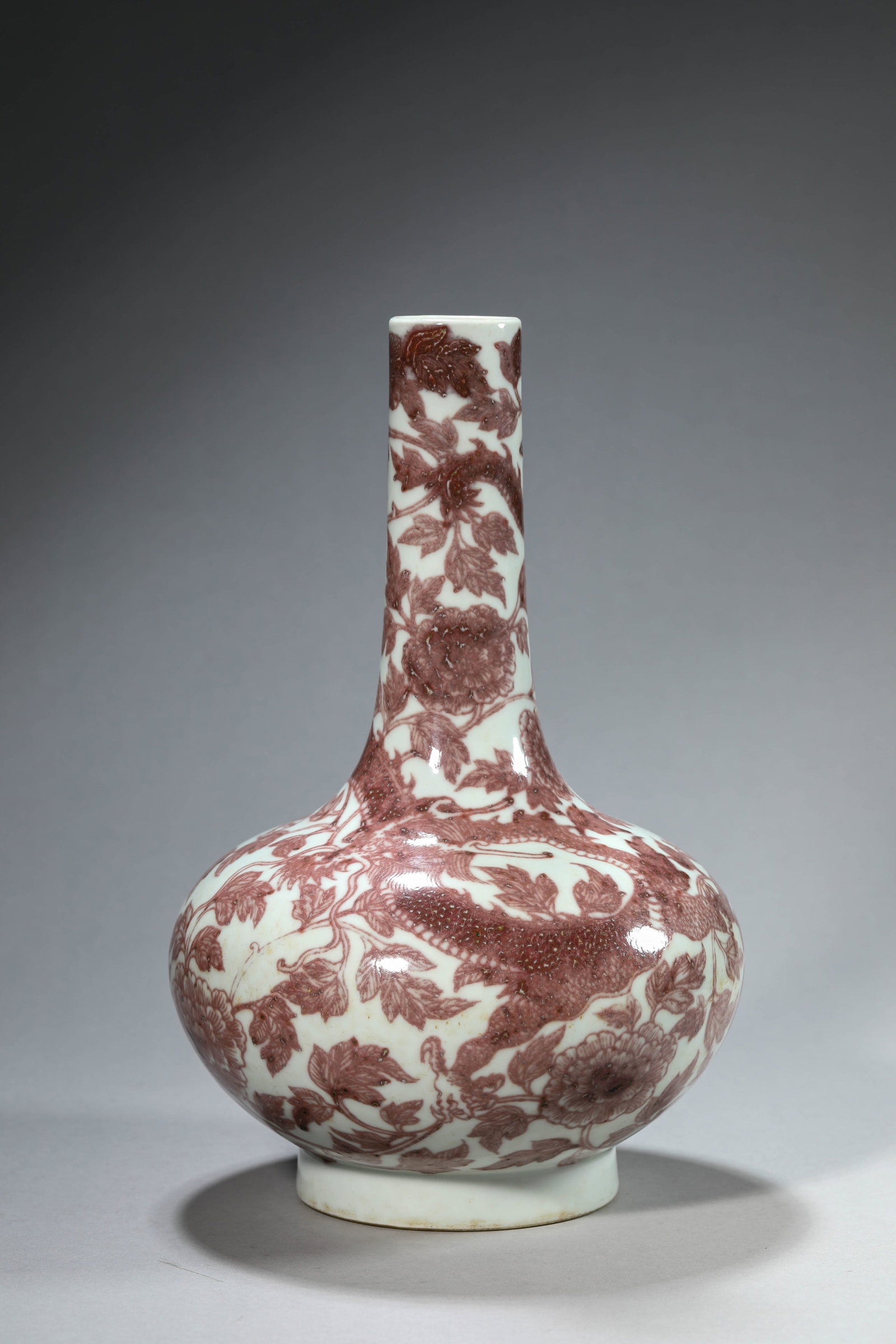 AN UNDERGLAZE-RED 'DRAGON' 'WATER-CHESTNUT' VASE: AN UNDERGLAZE-RED 'DRAGON' 'WATER-CHESTNUT' VASE Description: Dimensions: Width: 19 cm x Height: 29.1 cm. All measurements are approximate.