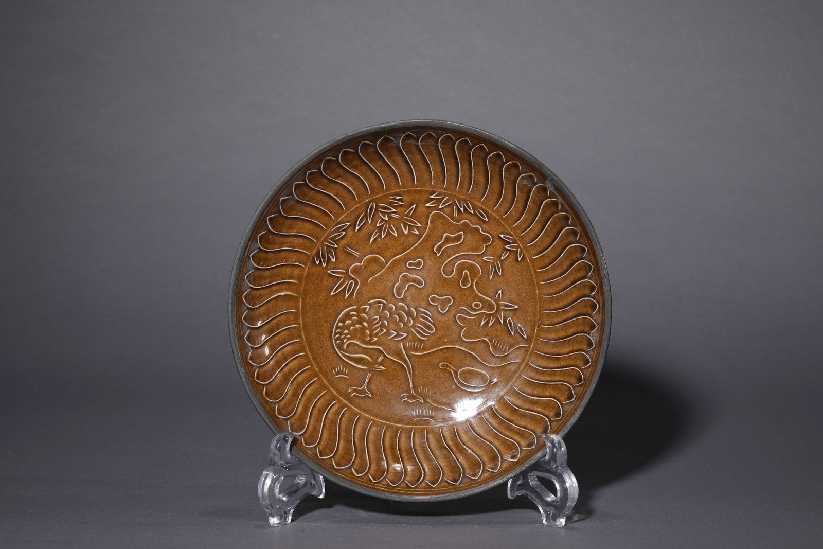 A DING-TYPE 'RIM-MOUNTED' BLACK-GLAZED DISH: A DING-TYPE 'RIM-MOUNTED' BLACK-GLAZED DISH Description: Dimensions: Width: 19.8 cm x Height: 4.2 cm. All measurements are approximate.