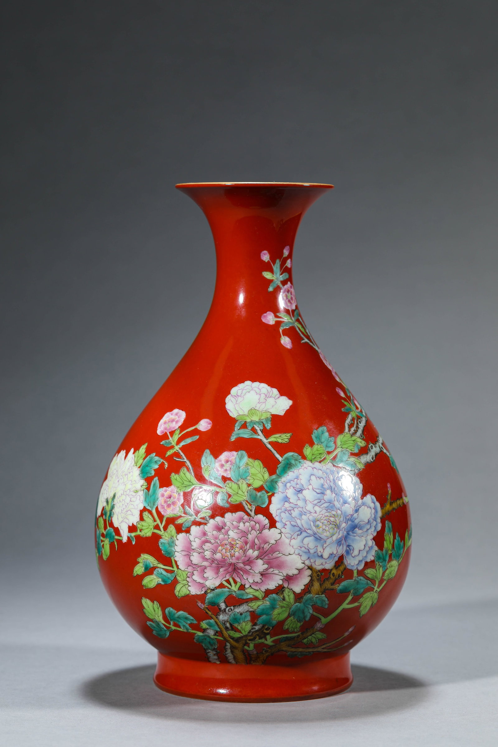 A CORAL-RED-GROUND FAMILLE-ROSE 'FLORAL' YUHUCHUN: A CORAL-RED-GROUND FAMILLE-ROSE 'FLORAL' YUHUCHUN Description: Dimensions: Width: 17.5 cm x Height: 28.6 cm. All measurements are approximate.