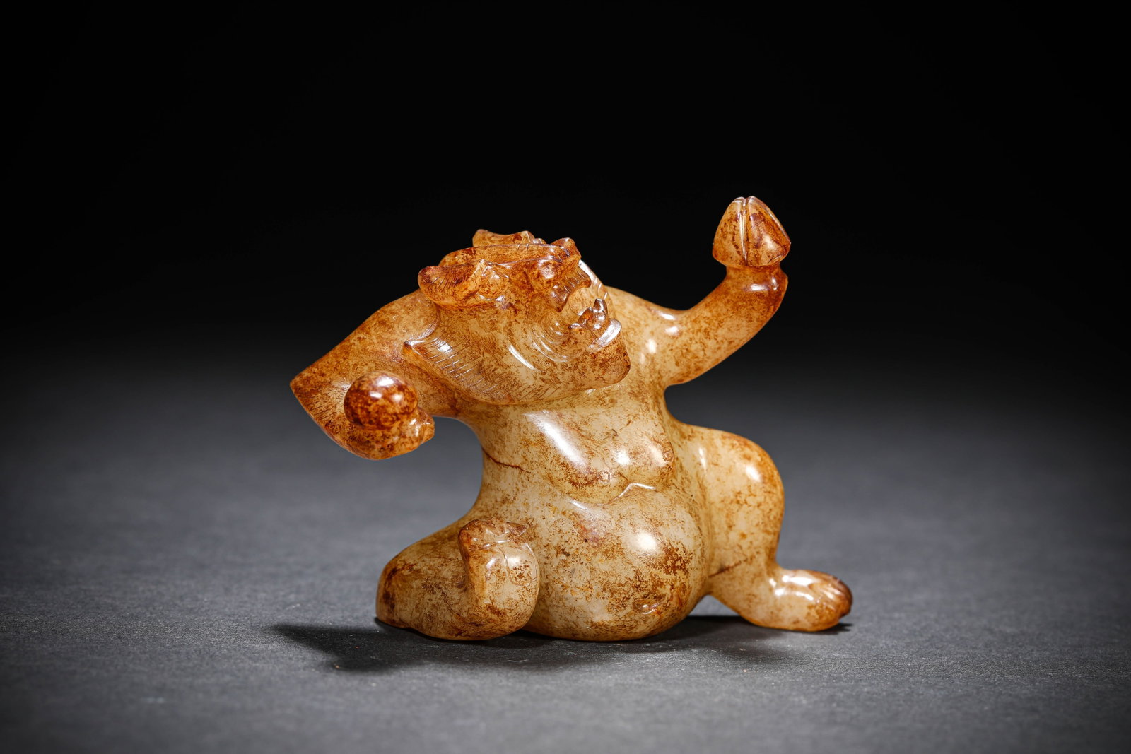 A JADE BEAST: A JADE BEAST Description: Dimensions: Length: 9 cm x Width: 3.9 cm x Height: 6.9 cm. All measurements are approximate.