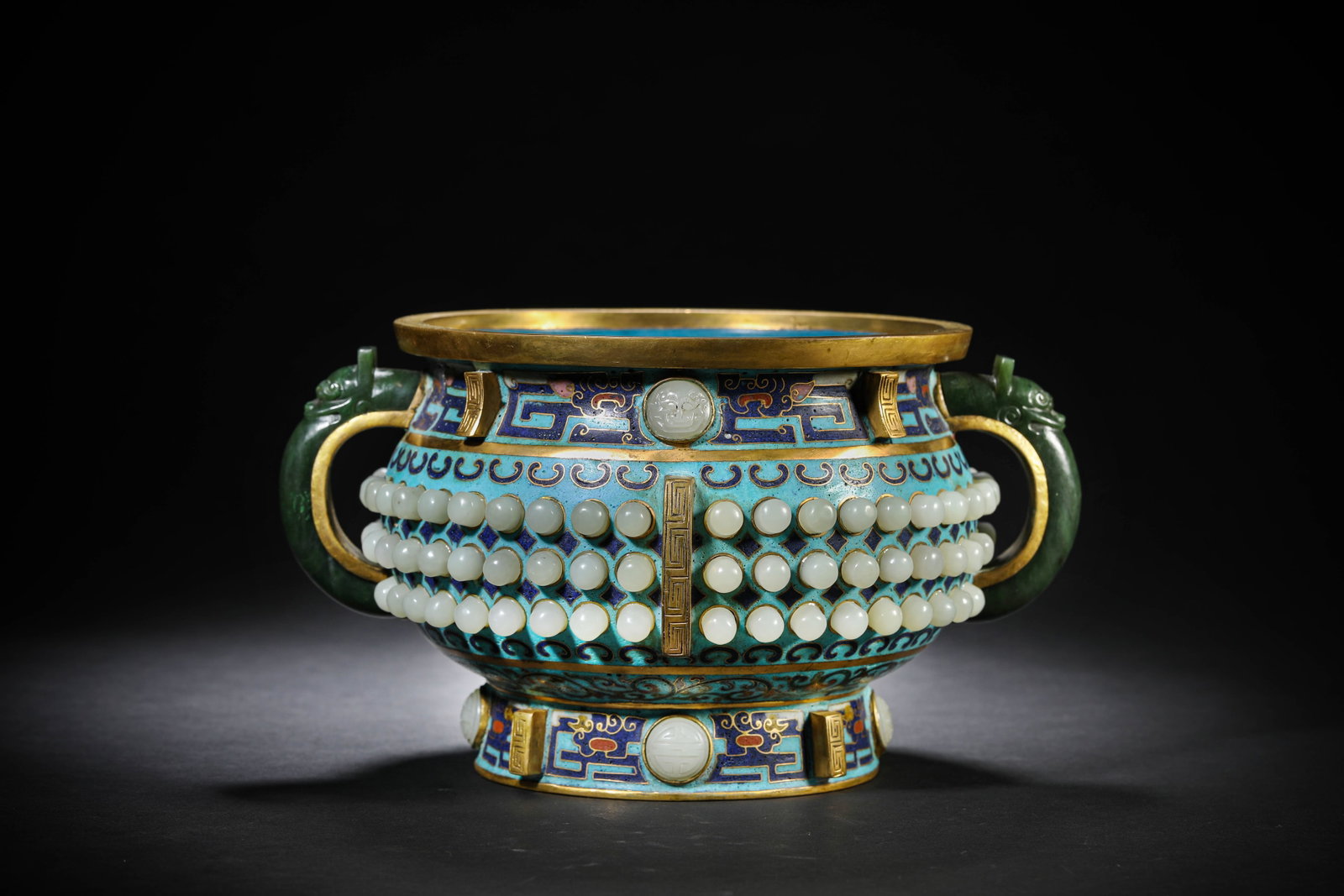 A CLOISONNE ENAMEL AND JADE-INLAID 'GUI-FORM' CENSER: A CLOISONNE ENAMEL AND JADE-INLAID 'GUI-FORM' CENSER Description: Dimensions: Weight: 1707 g. Length: 23.2 cm x Width: 18.8 cm x Height: 13.2 cm. All measurements are approximate.