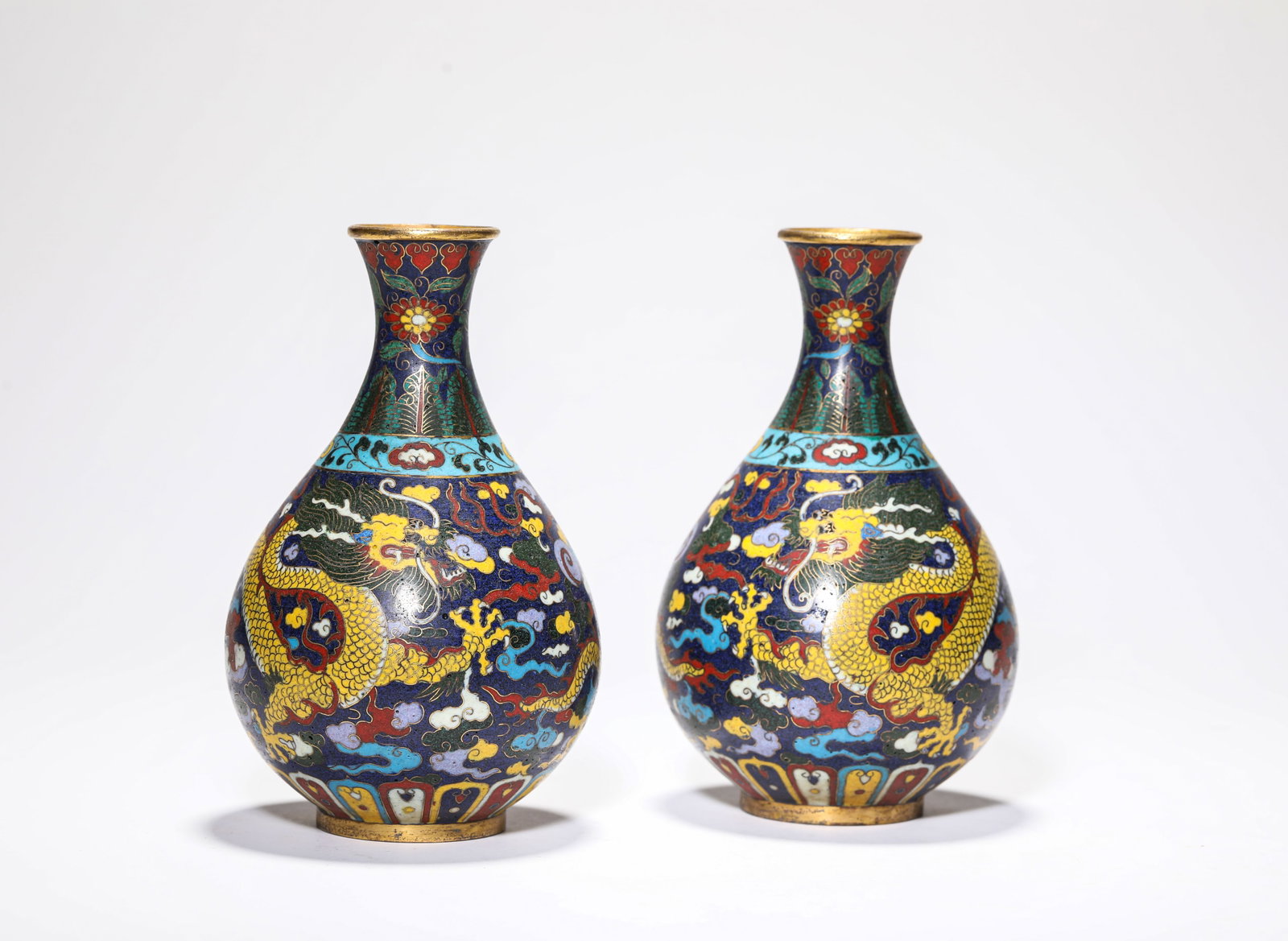 A PAIR OF CLOISONNE ENAMEL 'DRAGON AND CLOUDS' YUHUCHUN: A PAIR OF CLOISONNE ENAMEL 'DRAGON AND CLOUDS' YUHUCHUN Description: Dimensions: Weight: 1108 g. Width: 10.2 cm x Height: 16.3 cm. All measurements are approximate.