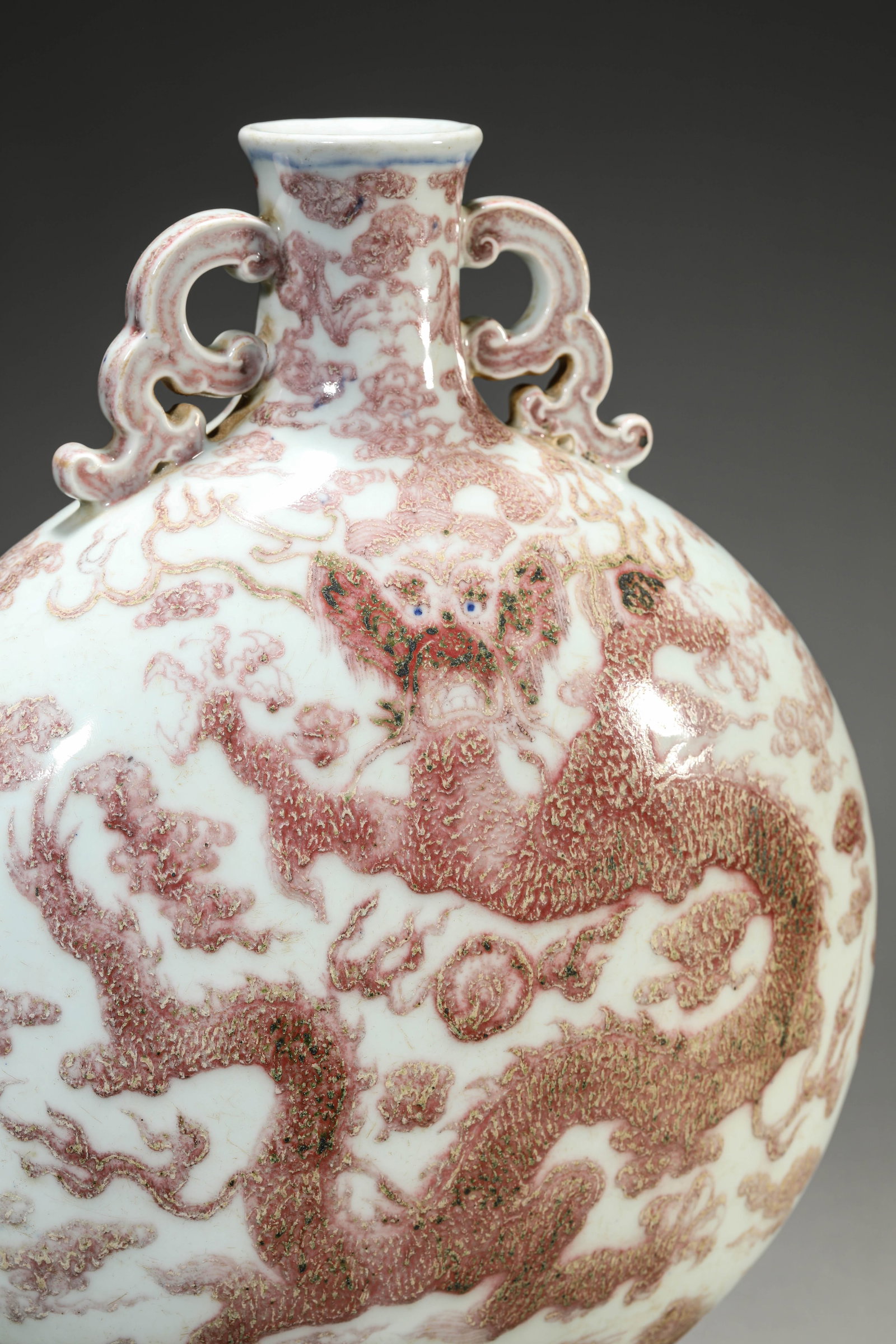 AN UNDERGLAZE-RED 'DRAGON AND CLOUDS' MOONFLASK - 2