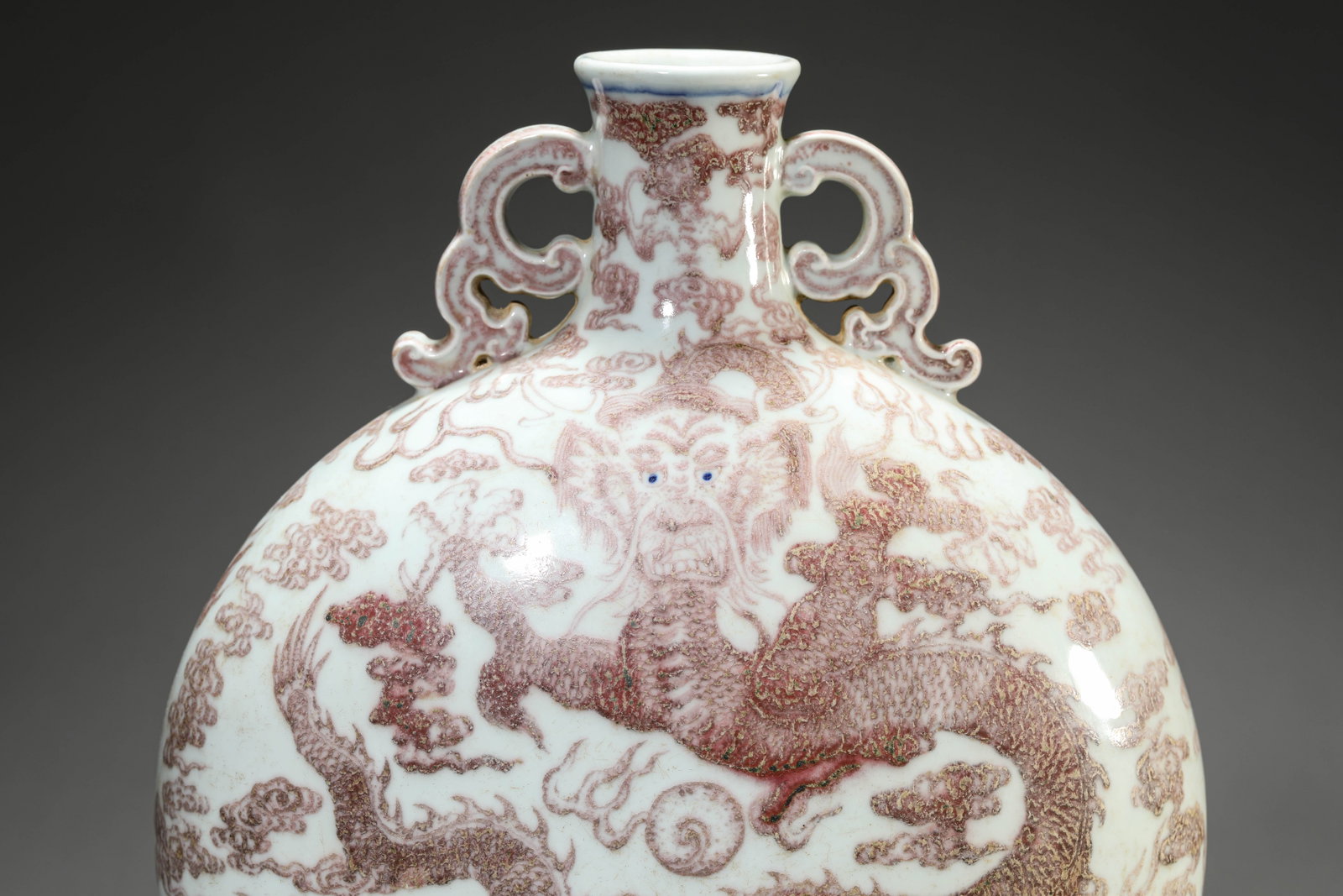 AN UNDERGLAZE-RED 'DRAGON AND CLOUDS' MOONFLASK - 4