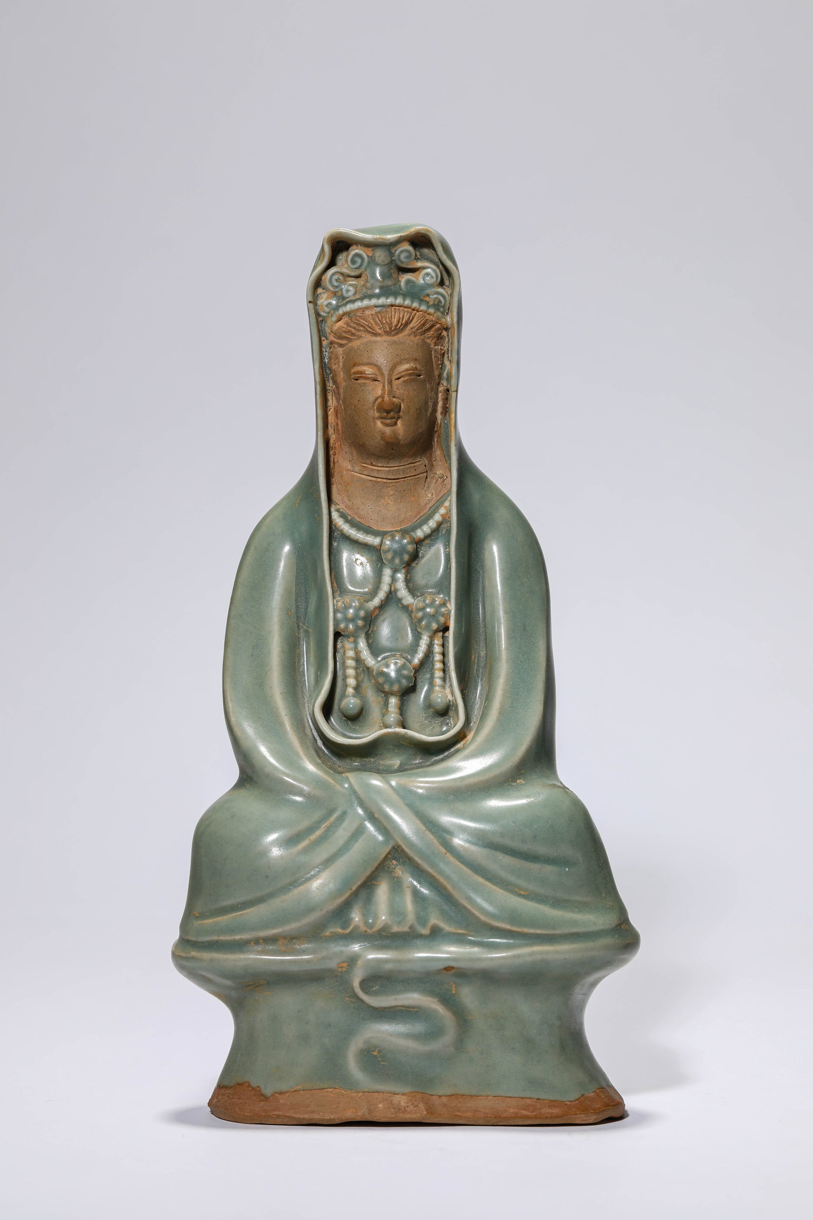 A CELADON-GLAZED FIGURE OF AVALOKITESHVARA (1 of 6)