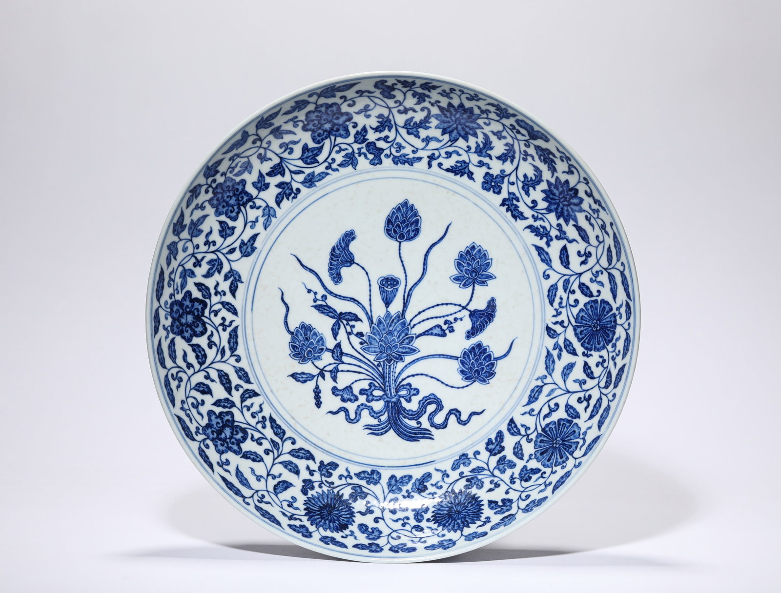 A BLUE AND WHITE 'LOTUS BOUQUET' DISH (1 of 7)