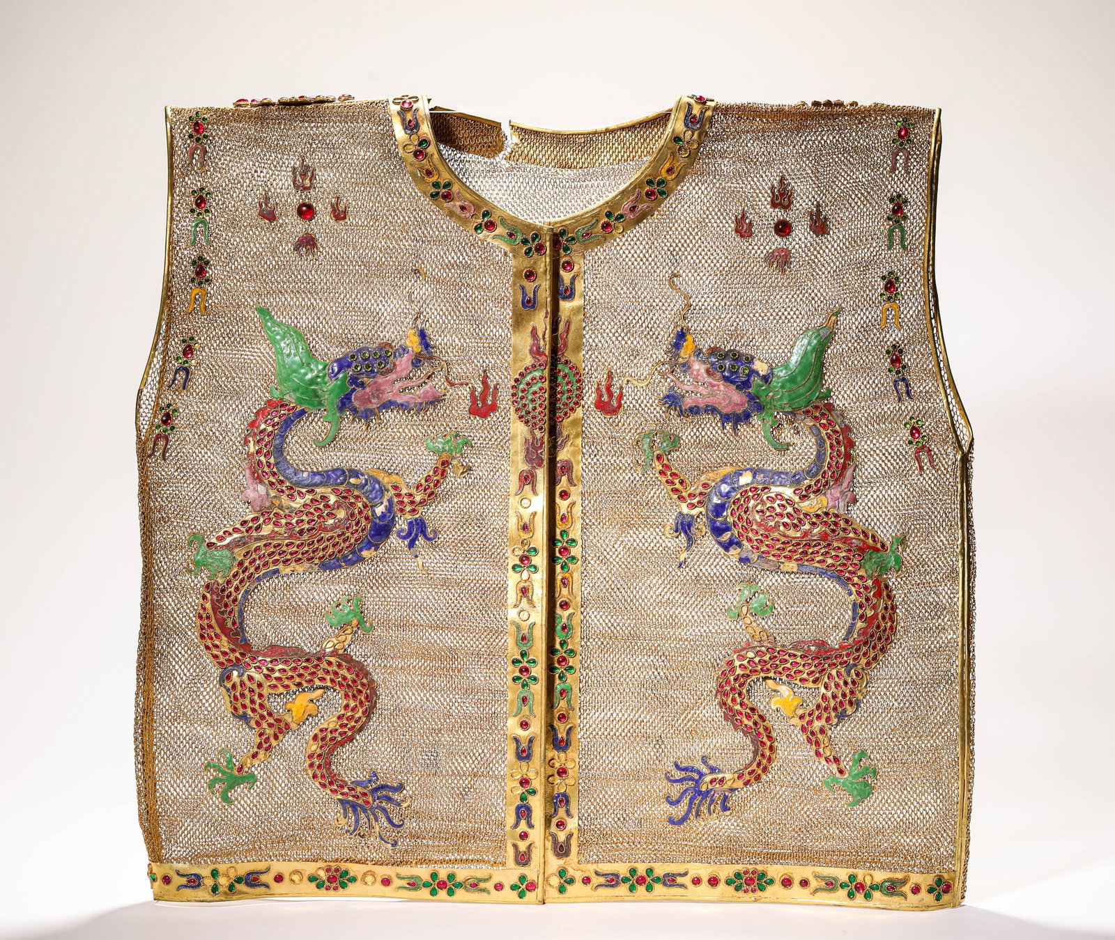 A GILT-BRONZE FILIGREE 'DRAGON' HORSE ARMOUR: A GILT-BRONZE FILIGREE 'DRAGON' HORSE ARMOUR Description: Dimensions: Weight: 1300 g. Width: 50 cm x Height: 48 cm. All measurements are approximate.