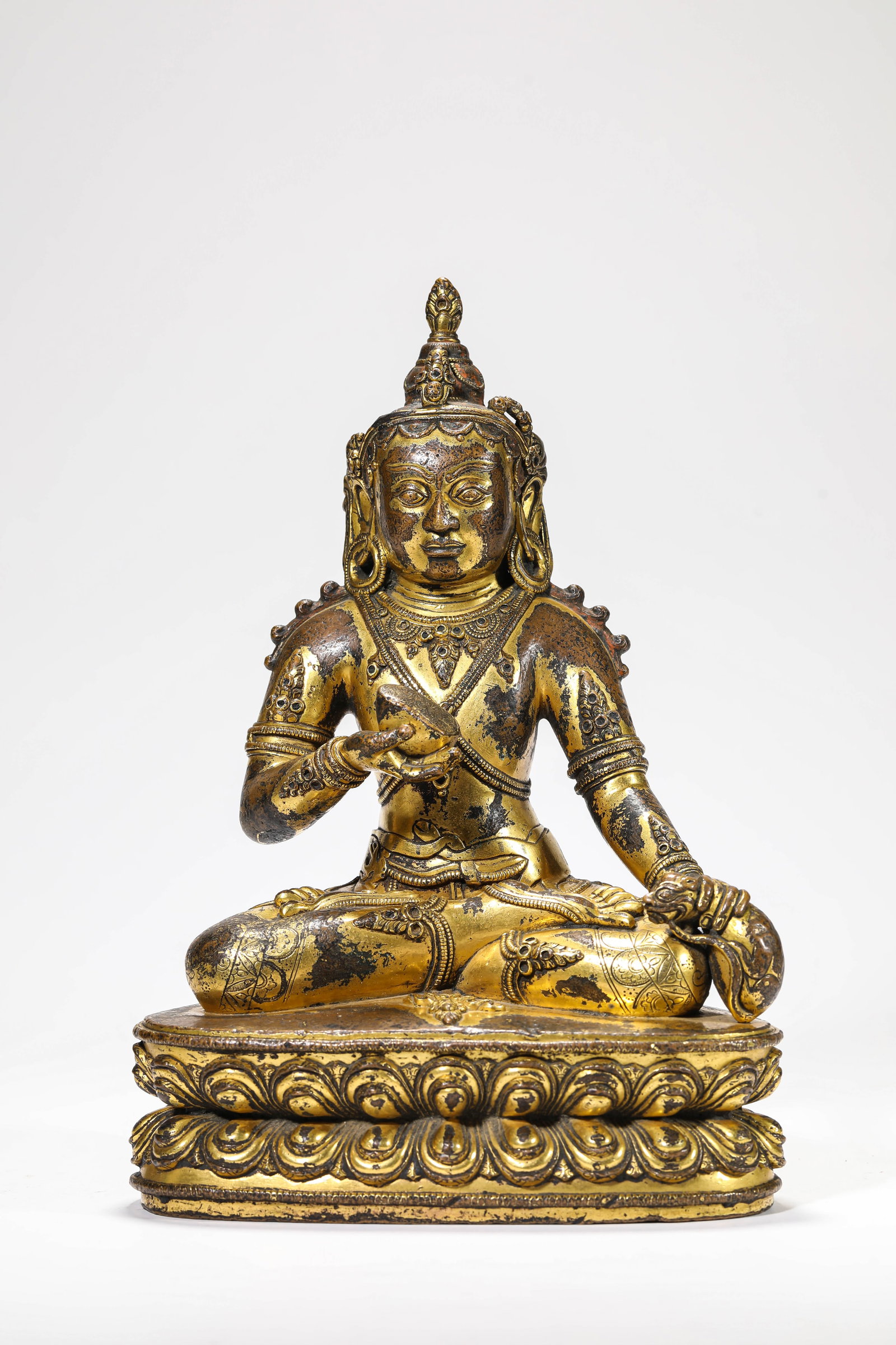 A 'TIBETAN DENSATIL MONASTERY-STYLE' FIGURE OF A JAMBHALA: A 'TIBETAN DENSATIL MONASTERY-STYLE' FIGURE OF A JAMBHALA Description: Dimensions: Weight: 4650 g. Length: 18.9 cm x Width: 13 cm x Height: 26.7 cm. All measurements are approximate.