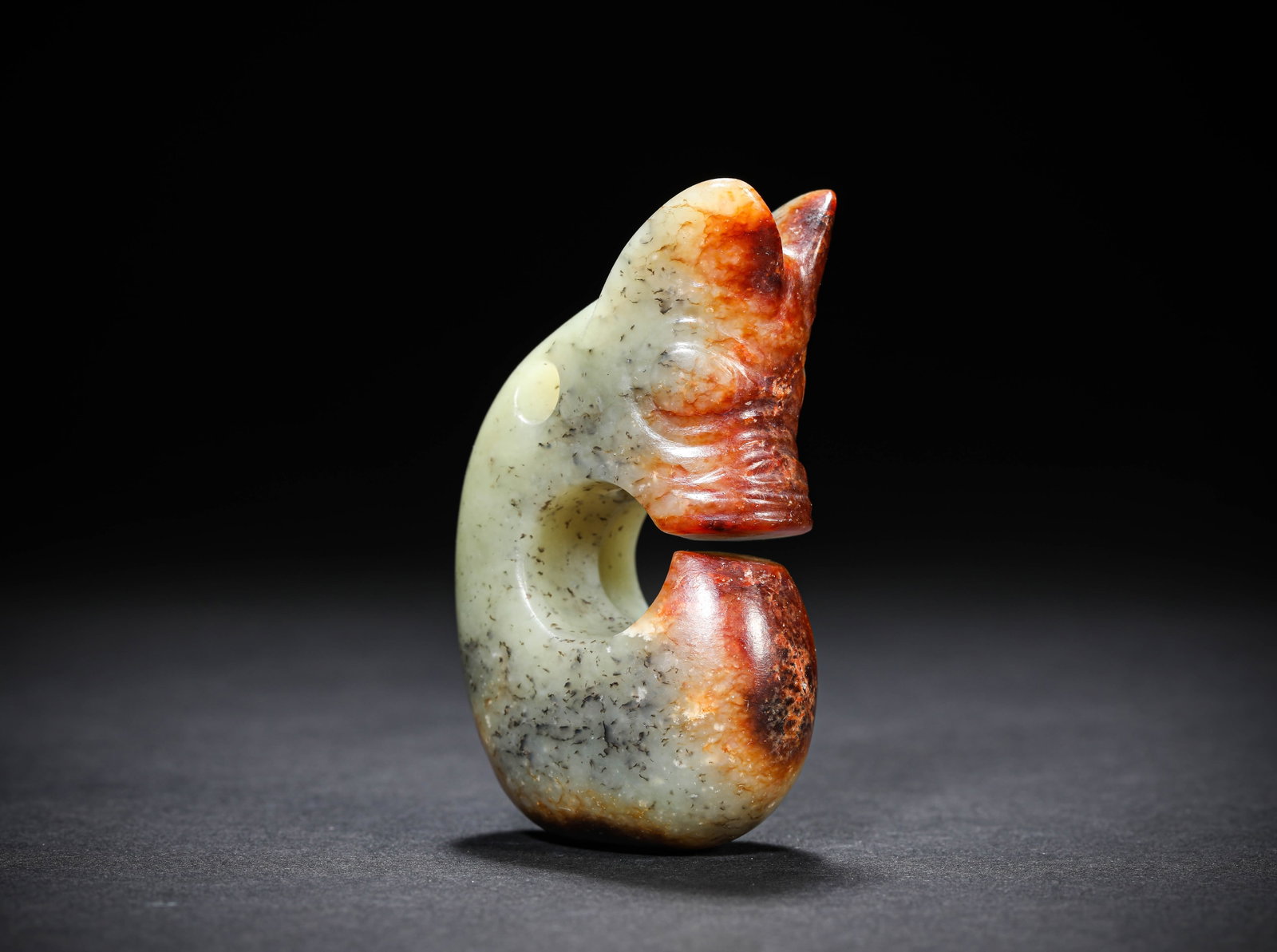 A JADE 'PIG-DRAGON': A JADE 'PIG-DRAGON' Description: Dimensions: Length: 4.4 cm x Width: 2.5 cm x Height: 7.6 cm. All measurements are approximate.