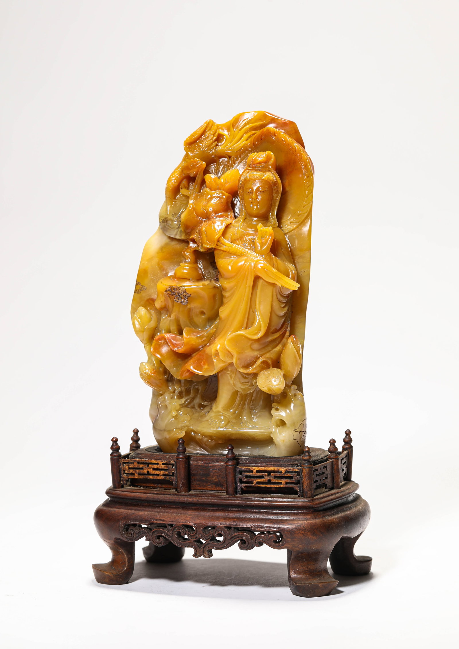 A SHOUSHAN STONE 'CARVED' FIGURE OF AVALOKITESHVARA: A SHOUSHAN STONE 'CARVED' FIGURE OF AVALOKITESHVARA Description: Dimensions: Length: 9.5 cm x Width: 5.8 cm x Height: 18 cm. All measurements are approximate.