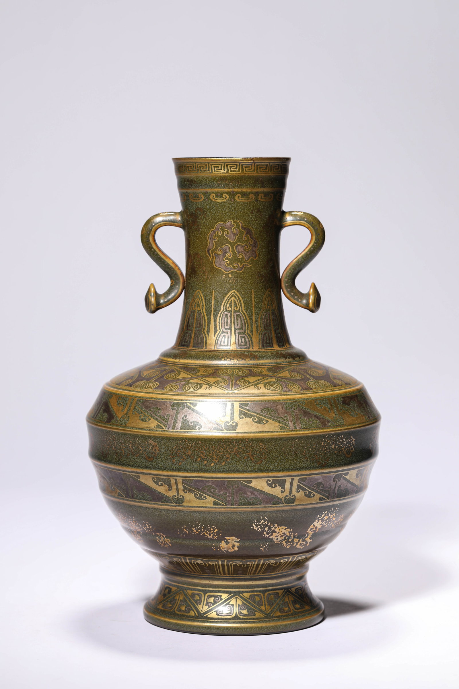 A TEA-DUST-GLAZED GILT-DECORATED 'RUYI HANDLES' VASE: A TEA-DUST-GLAZED GILT-DECORATED 'RUYI HANDLES' VASE Description: Dimensions: Width: 16.3 cm x Height: 25.8 cm. All measurements are approximate.