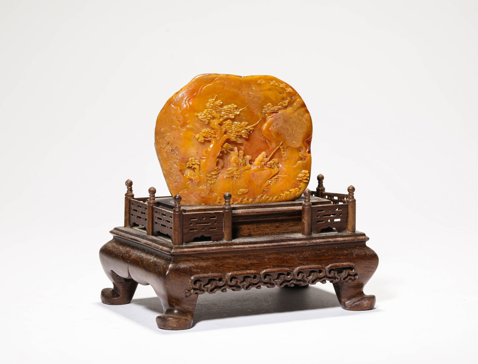 A SHOUSHAN STONE 'CARVED NARRATIVE SCENE' MOUNTAIN ORNAMENT: A SHOUSHAN STONE 'CARVED NARRATIVE SCENE' MOUNTAIN ORNAMENT Description: Dimensions: Length: 9.9 cm x Width: 5.3 cm x Height: 8.5 cm. All measurements are approximate.