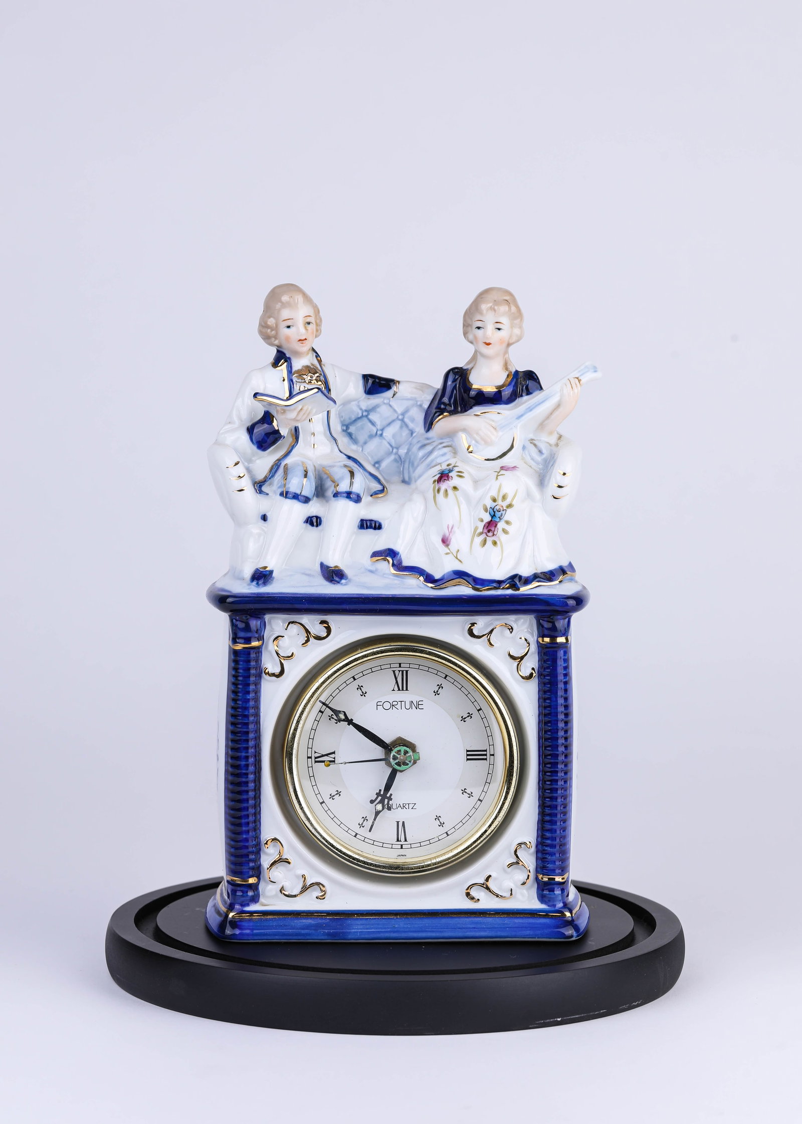 A 'FORTUNE' PORCELAIN FIGURE CLOCK - 2