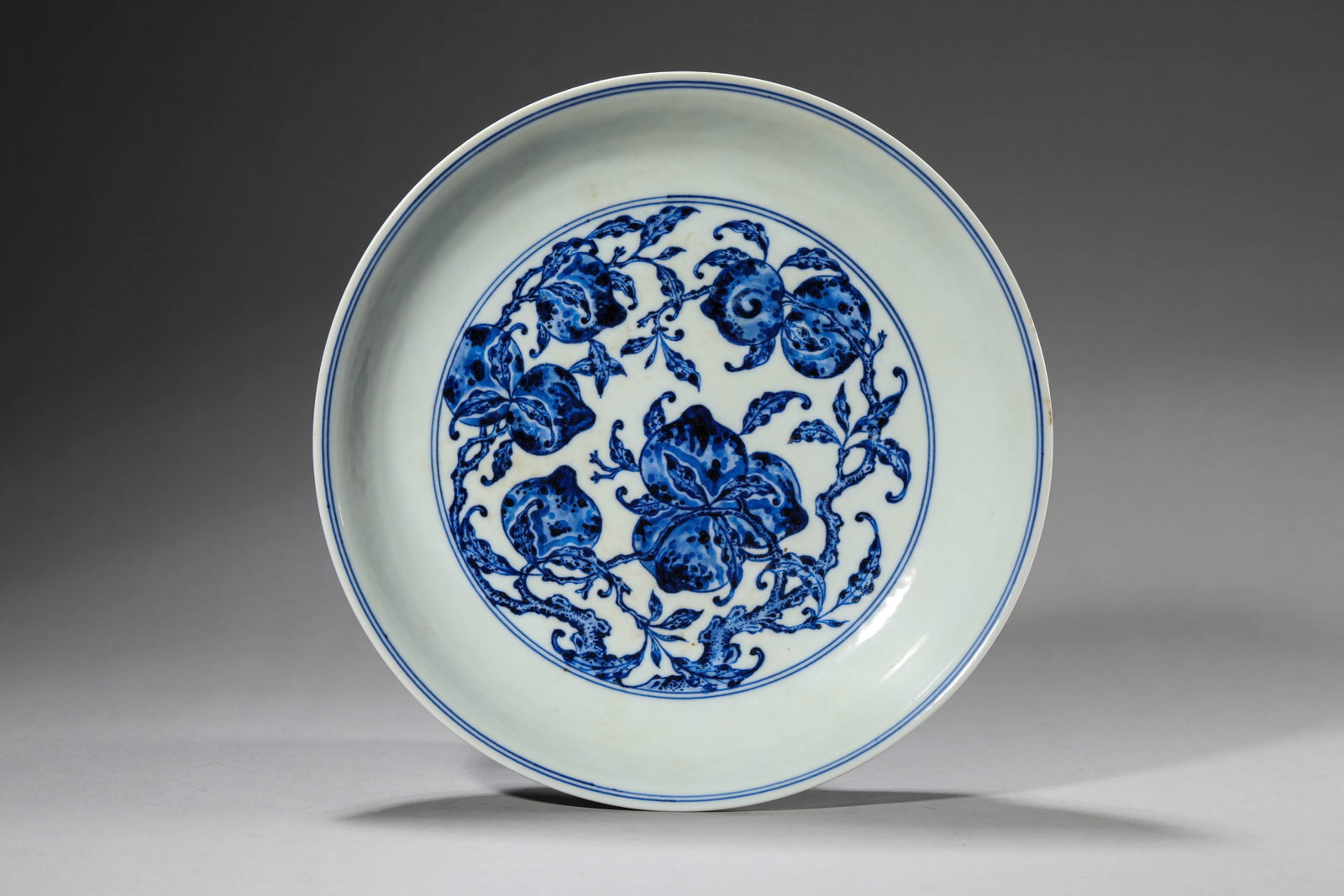 A BLUE AND WHITE 'FU, LU, SHOU' DISH (1 of 6)