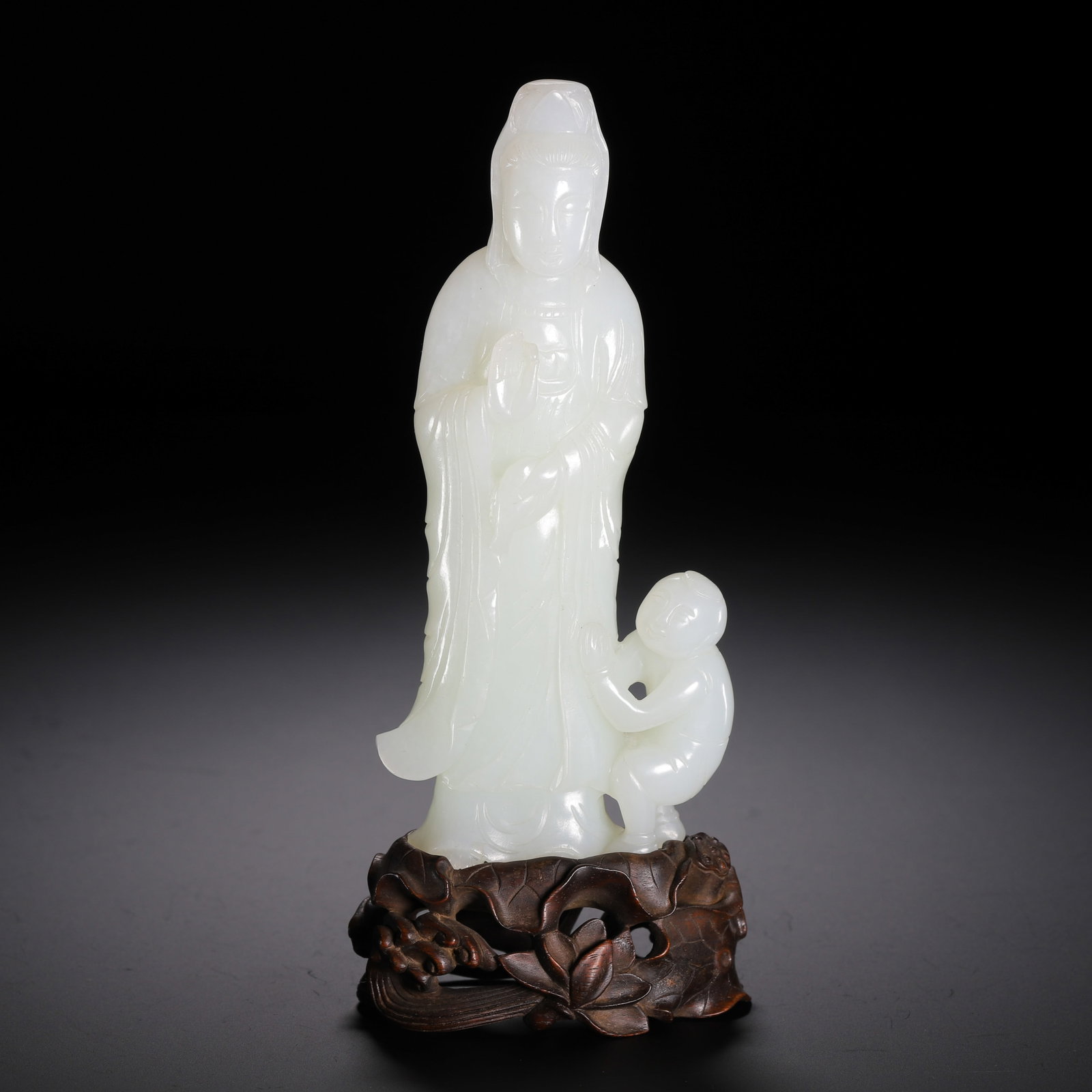 A CARVED WHITE JADE GUANYIN (1 of 9)