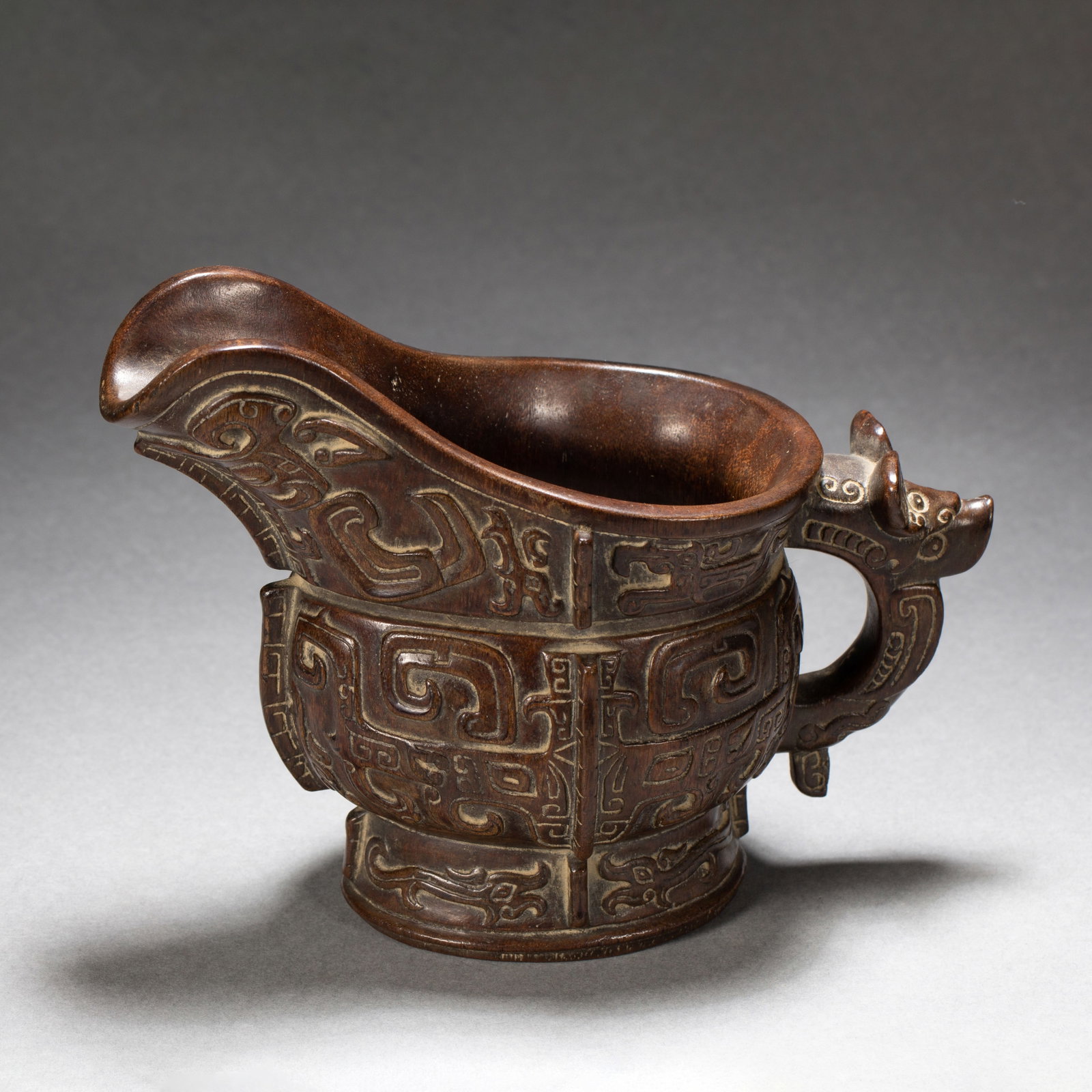 A Chinese Agarwood Jue Pouring Vessel: A Chinese Agarwood Jue Pouring Vessel (17.5 x 8 x 13.5cm,Weight 140 grams)