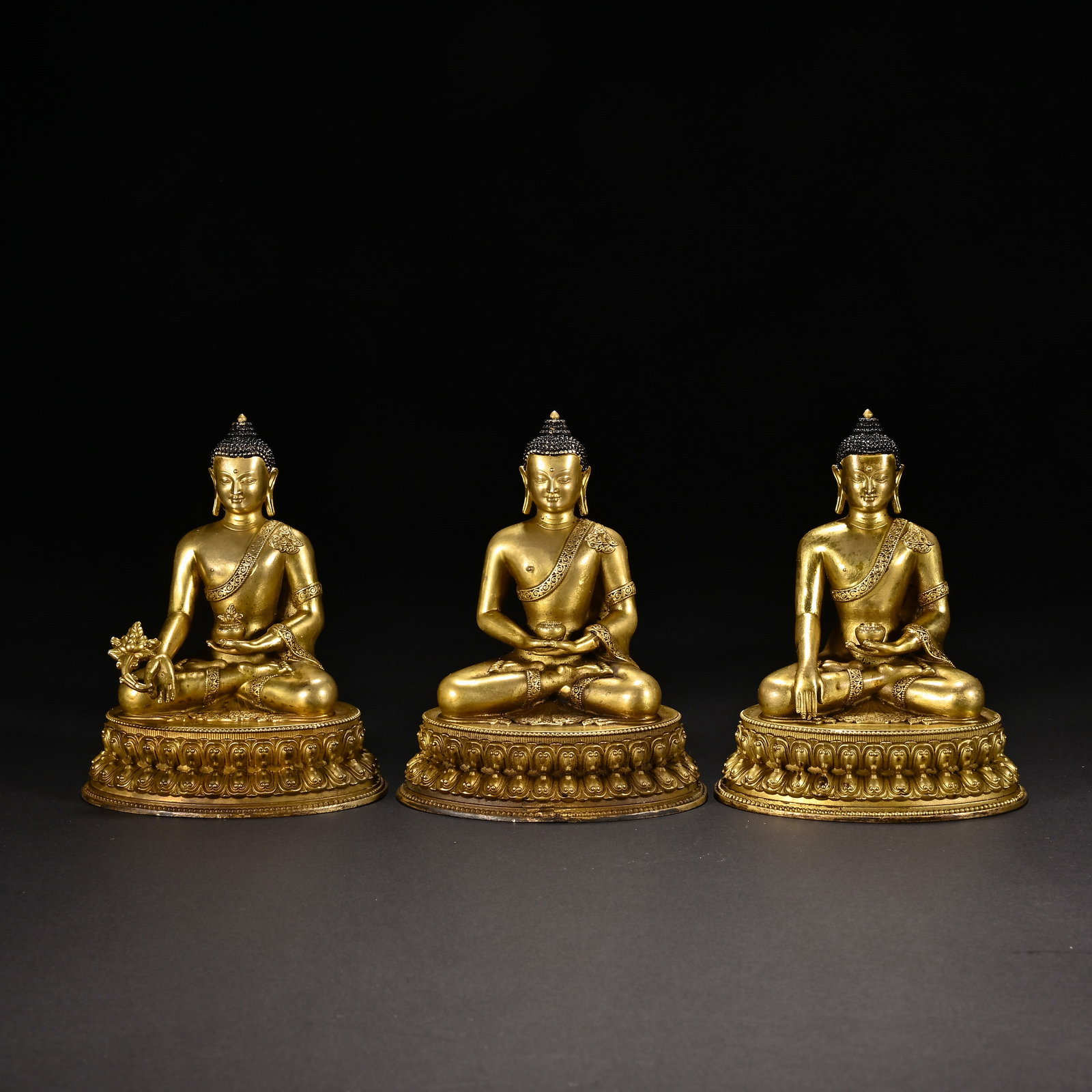 A Set of Three Chinese Gilt-Bronze Buddha Statues (1 of 7)