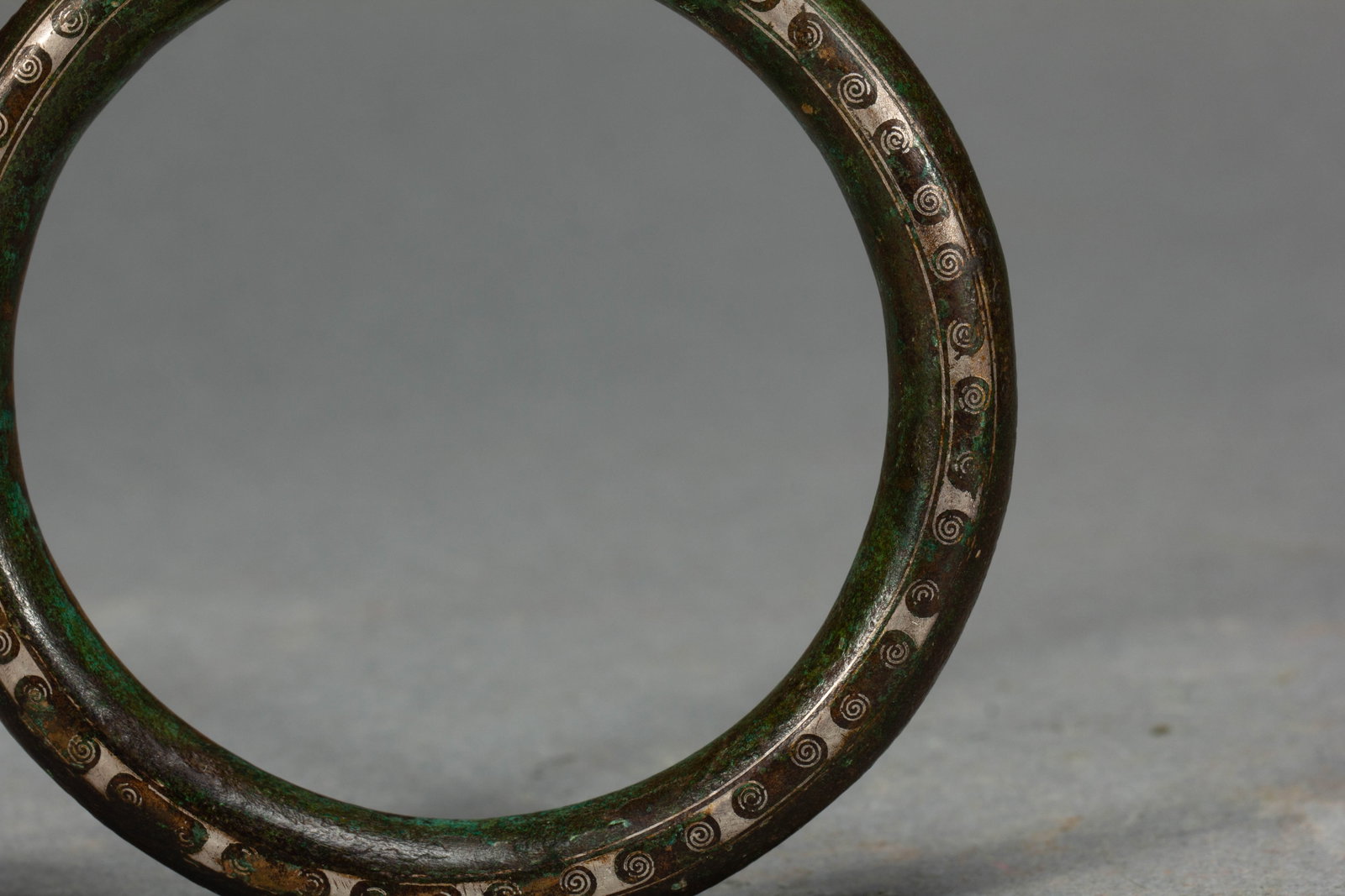 A Chinese Silver-Inlaid Bronze Bangle - 5