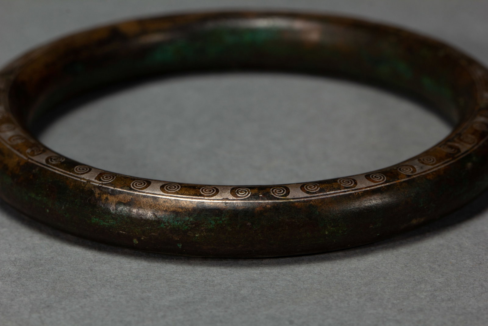 A Chinese Silver-Inlaid Bronze Bangle - 7