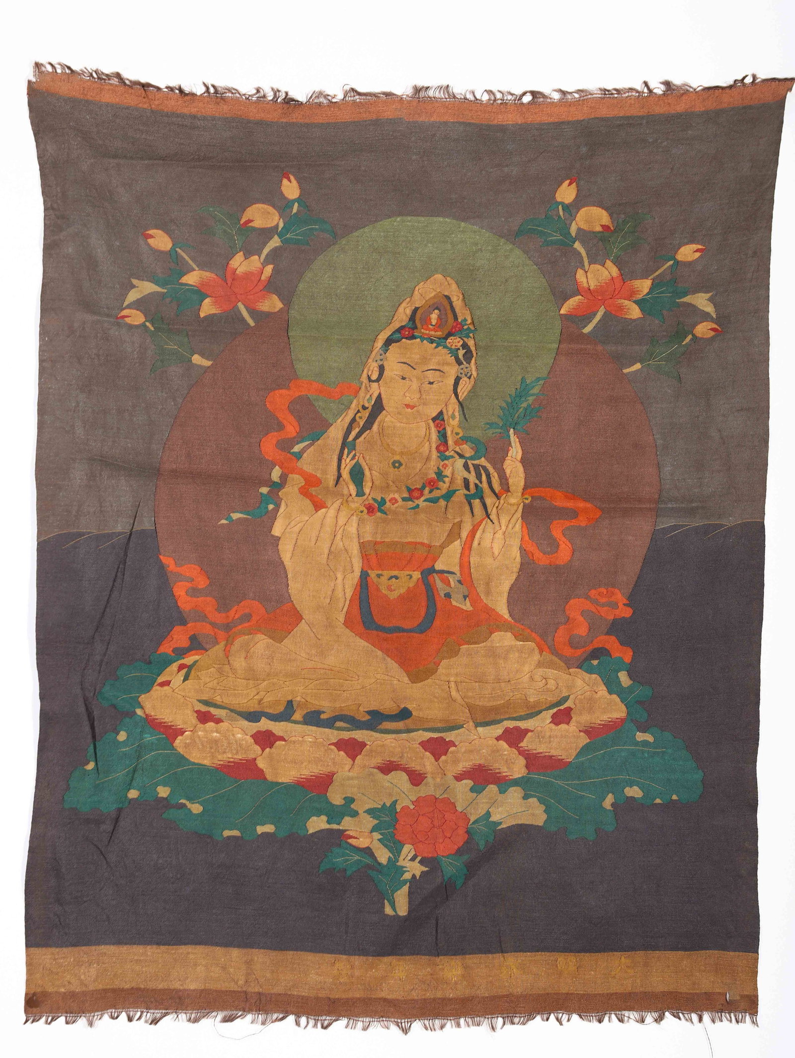 A CHINESE KESI GUANYIN TEXTILE HANGING: A CHINESE KESI GUANYIN TEXTILE HANGING (84 x 66cm)