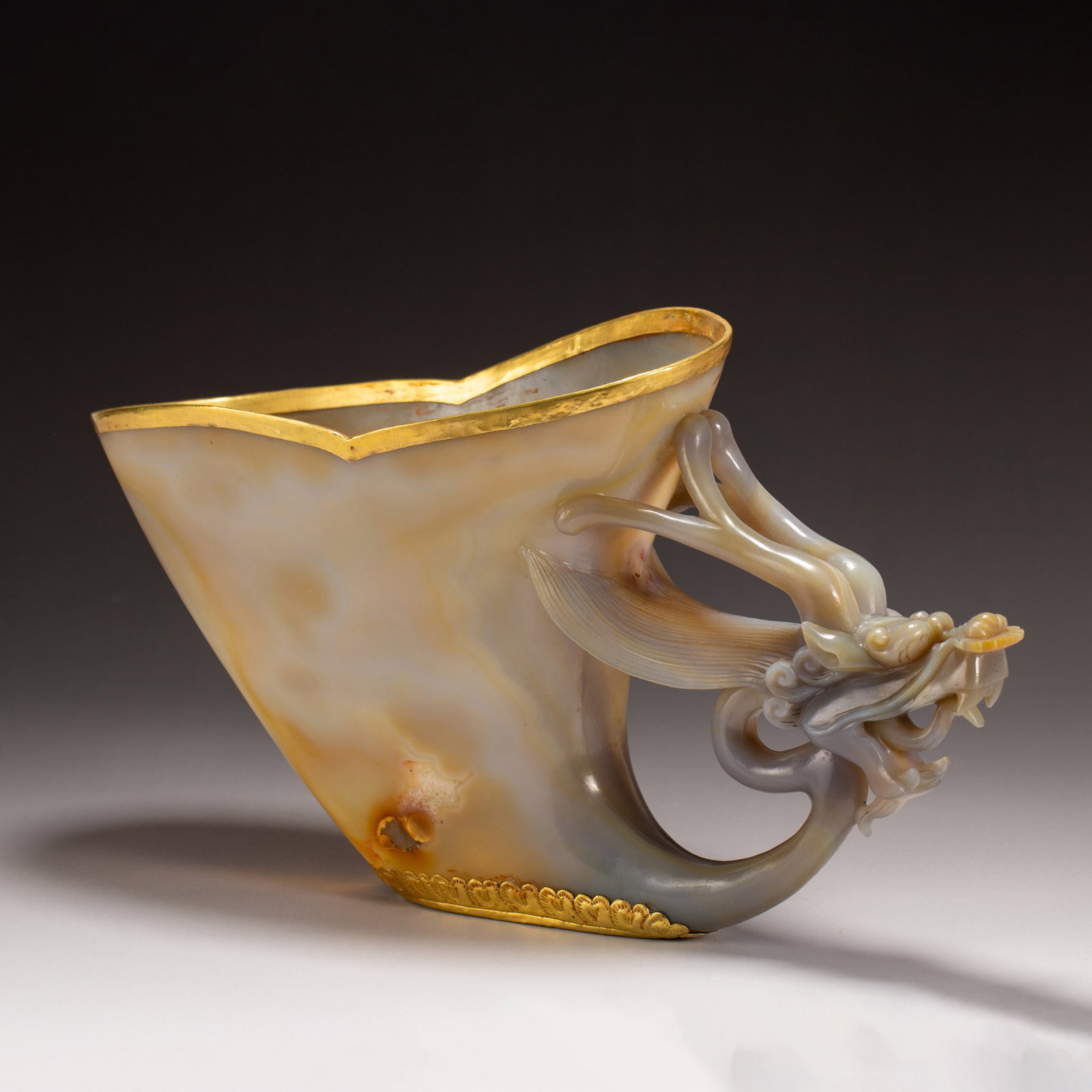 A Chinese Gilt Agate Dragon-Handled Cup: A Chinese Gilt Agate Dragon-Handled Cup (27.5 x 9.5 x 16cm,Weight 740 grams)