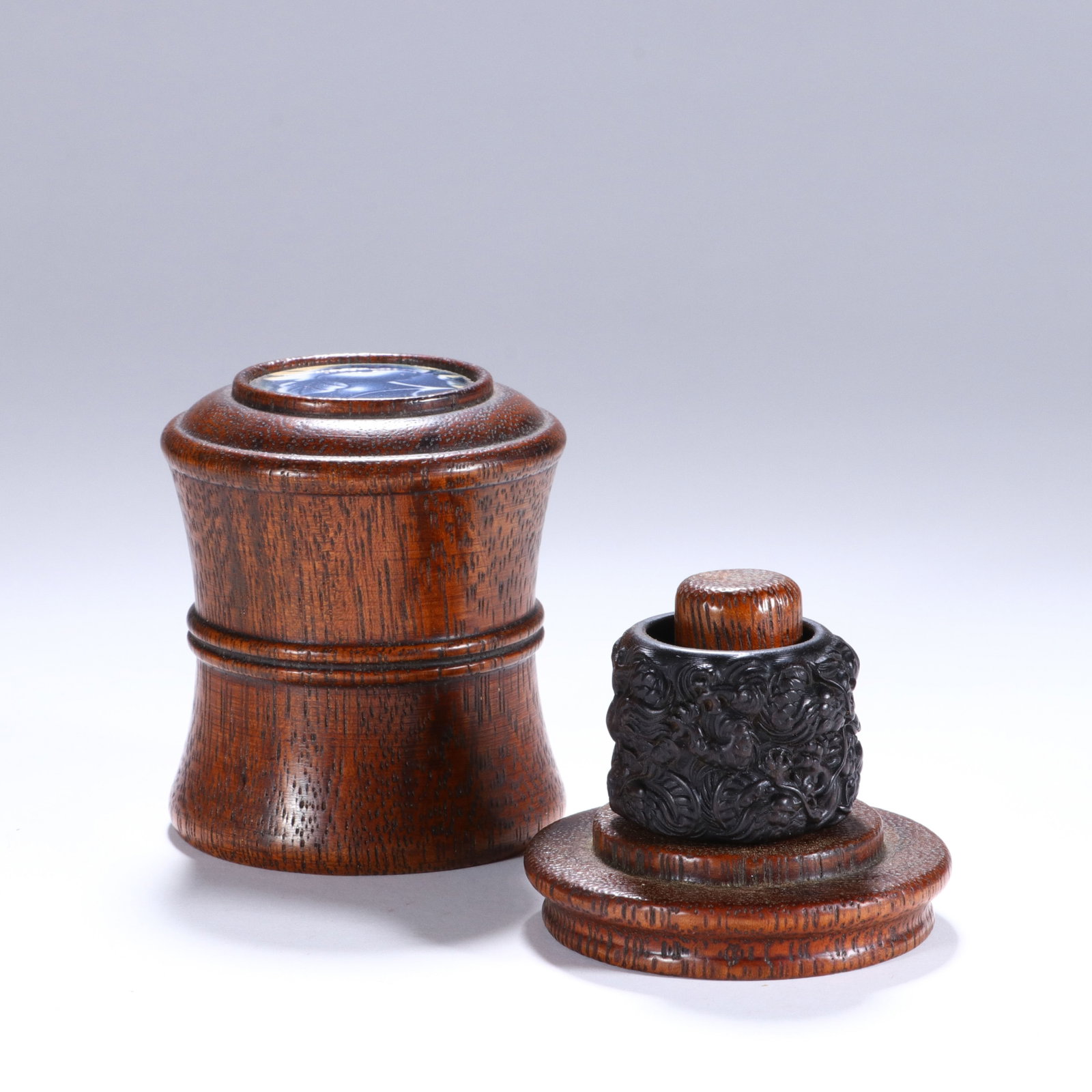 A Chinese Chenxiang Wood Archer's Ring with Case: A Chinese Chenxiang Wood Archer's Ring with Case (7.5 x 5.5cm)