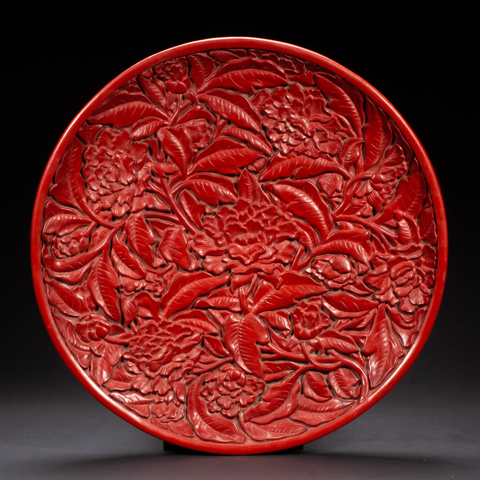 A Chinese Carved Red Lacquer Floral Dish: A Chinese Carved Red Lacquer Floral Dish (35 x 35 x 3cm,Weight 1770 grams)