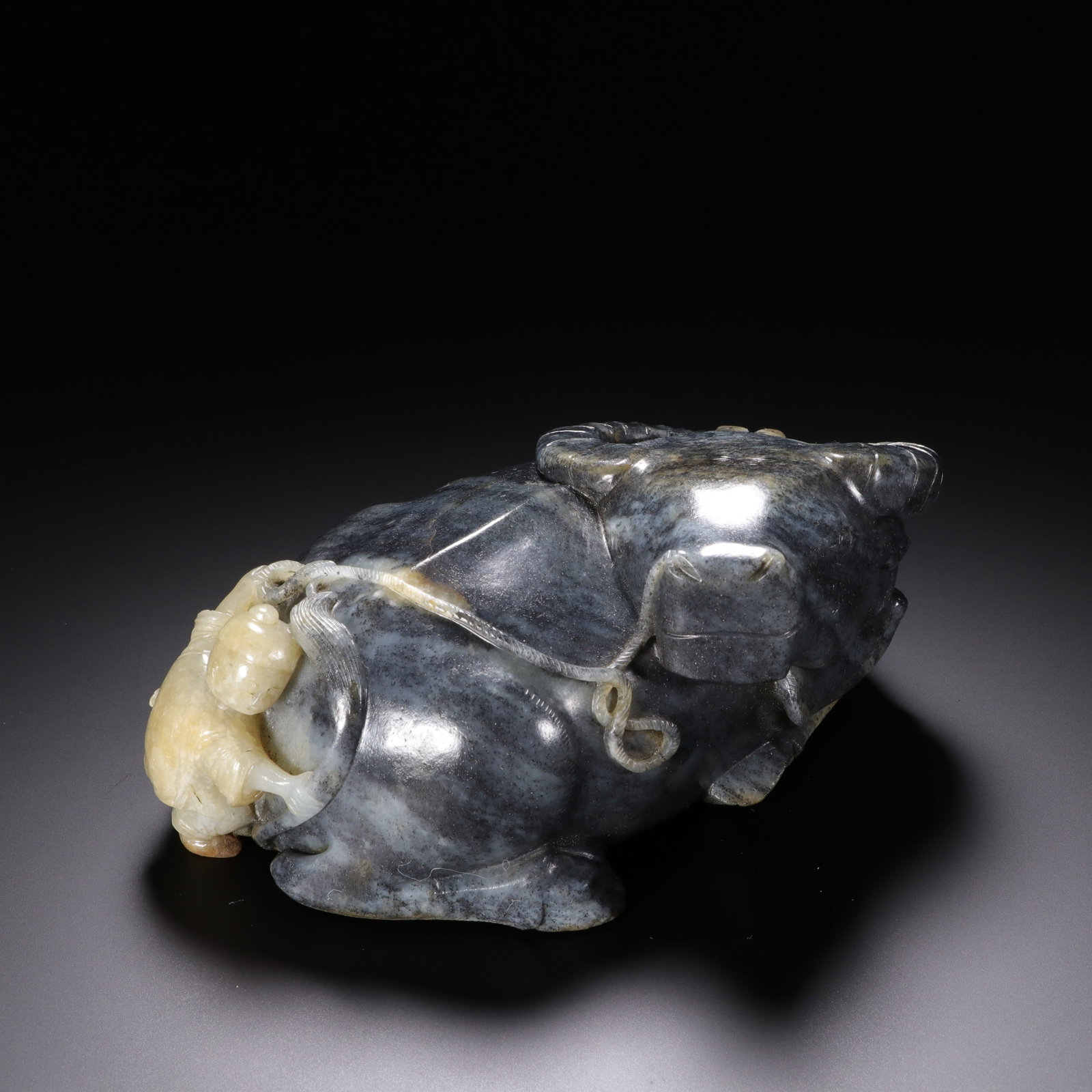 A Chinese Hetian Jade 'Boy and Buffalo' Carving: A Chinese Hetian Jade 'Boy and Buffalo' Carving (6.2 x 13.8cm)